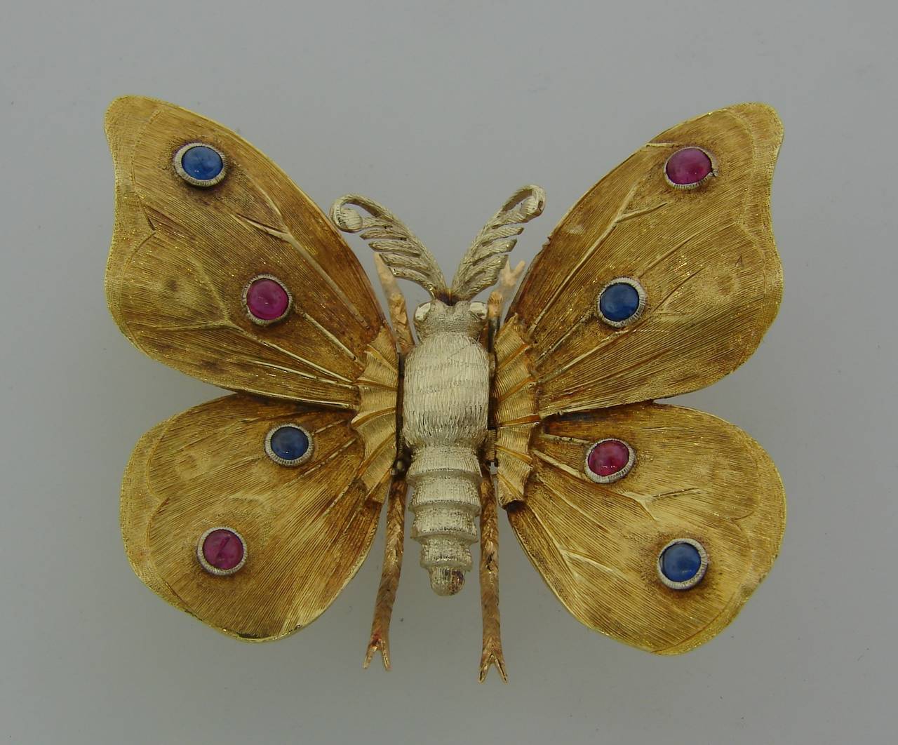 Stunning butterfly brooch created by Mario Buccellati in Italy in the 1950s. Perfect proportions, volume and signature Buccellati satin finish on gold are the highlights of the piece. 
The brooch measures 1-3/4