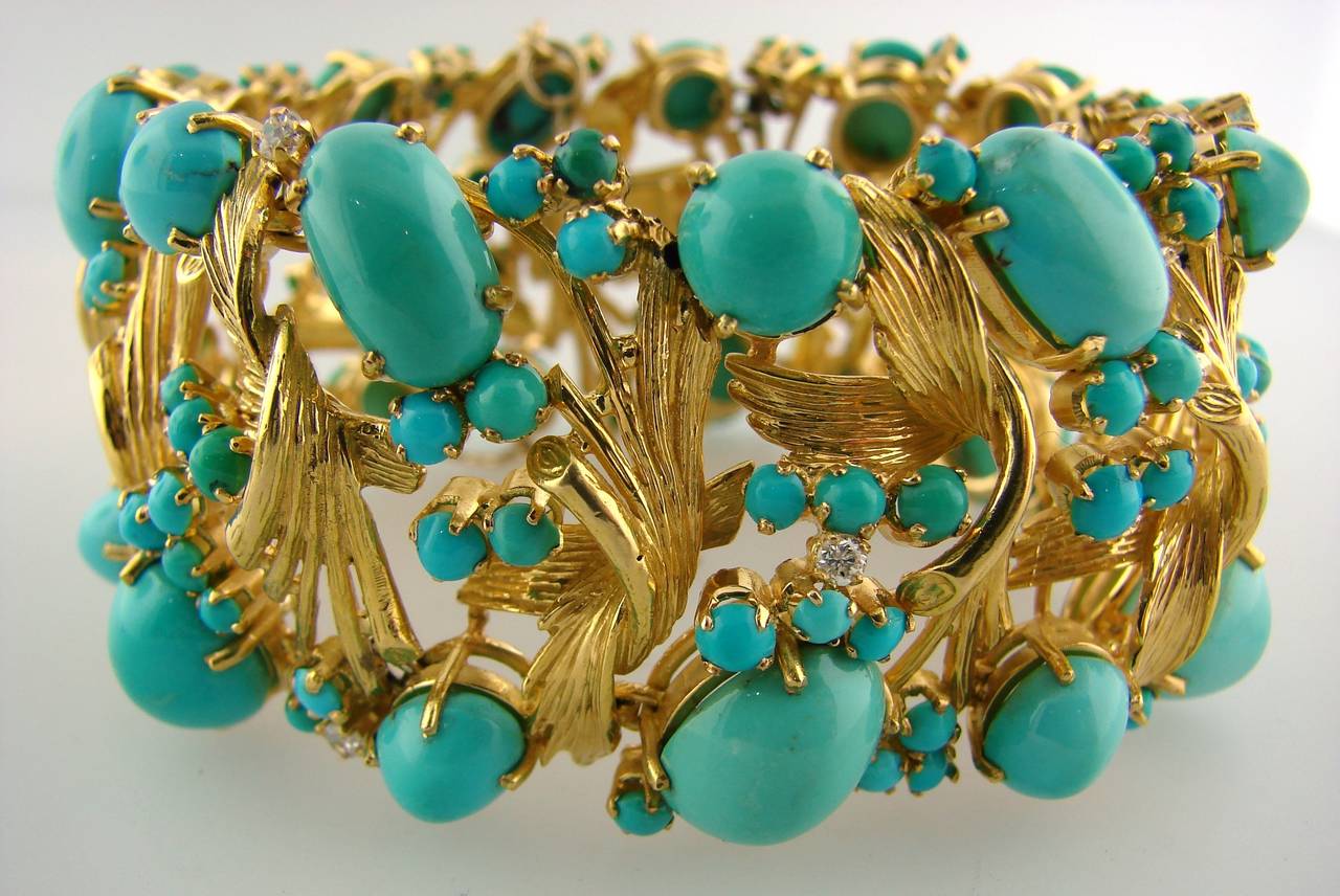 Gorgeous turquoise & yellow gold bracelet - a great piece to get for the summer! 
Made of 18k (tested) yellow gold and turquoise and sprinkled with round diamonds. Beautiful meticulous workmanship, whimsical design. 
The bracelet is 1-5/16