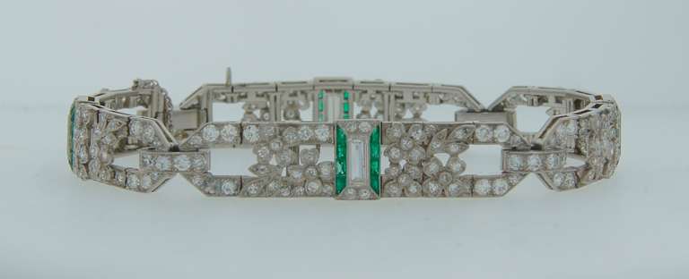 Classy and elegant Art Deco bracelet created in the 1920's. It tastefully combines strong Art Deco geometrical design with delicate floral motifs. Sensual and chic piece of jewelry.

The bracelet is made of platinum and encrusted with Old European
