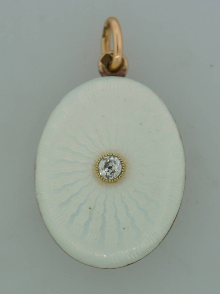 Gorgeous Imperial Russia enamel locket pendant created by Andre Adler between 1908 and 1917 in St. Petersburg. Andre Adler had his own goldsmith workshop in St.Petersburg and also made pieces for House of Faberge. Outstanding guilloche enamel work