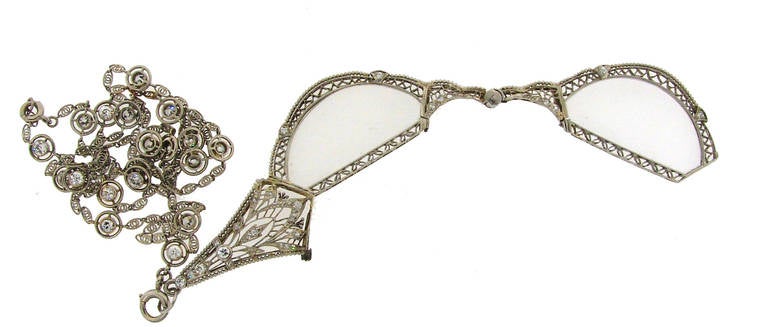 Fabulous Edwardian lorgnette - very fine openwork, outstanding craftsmanship!  
Made of platinum (tested) and set with Old European, single and old mine cut diamonds. Lorgnette is in perfect working condition, it opens up. You can put your