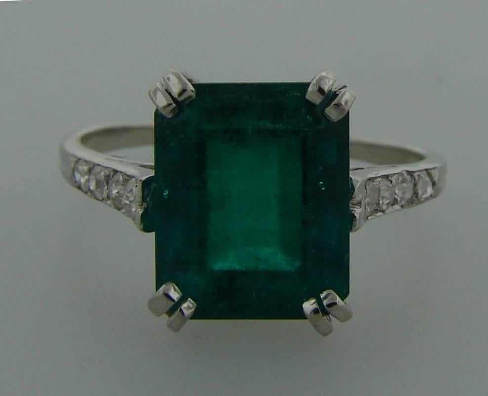 Stunning classy ring created by Boucheron, Paris in the 1930's. It features a 2.70 carat Colombian emerald set in platinum (tested) and accented with four Old European and four single cut diamonds. Diamond total weight is approximately 0.12