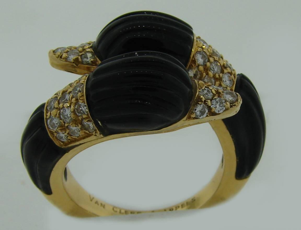Adorable Duck ring created  by Van Cleef & Arpels in the 1970's. 
Made of 18k yellow gold and black onyx and accented with forty two round brilliant cut diamonds (total weight approximately 0.84 carat). 
The ring is size 6.
It is stamped with VCA