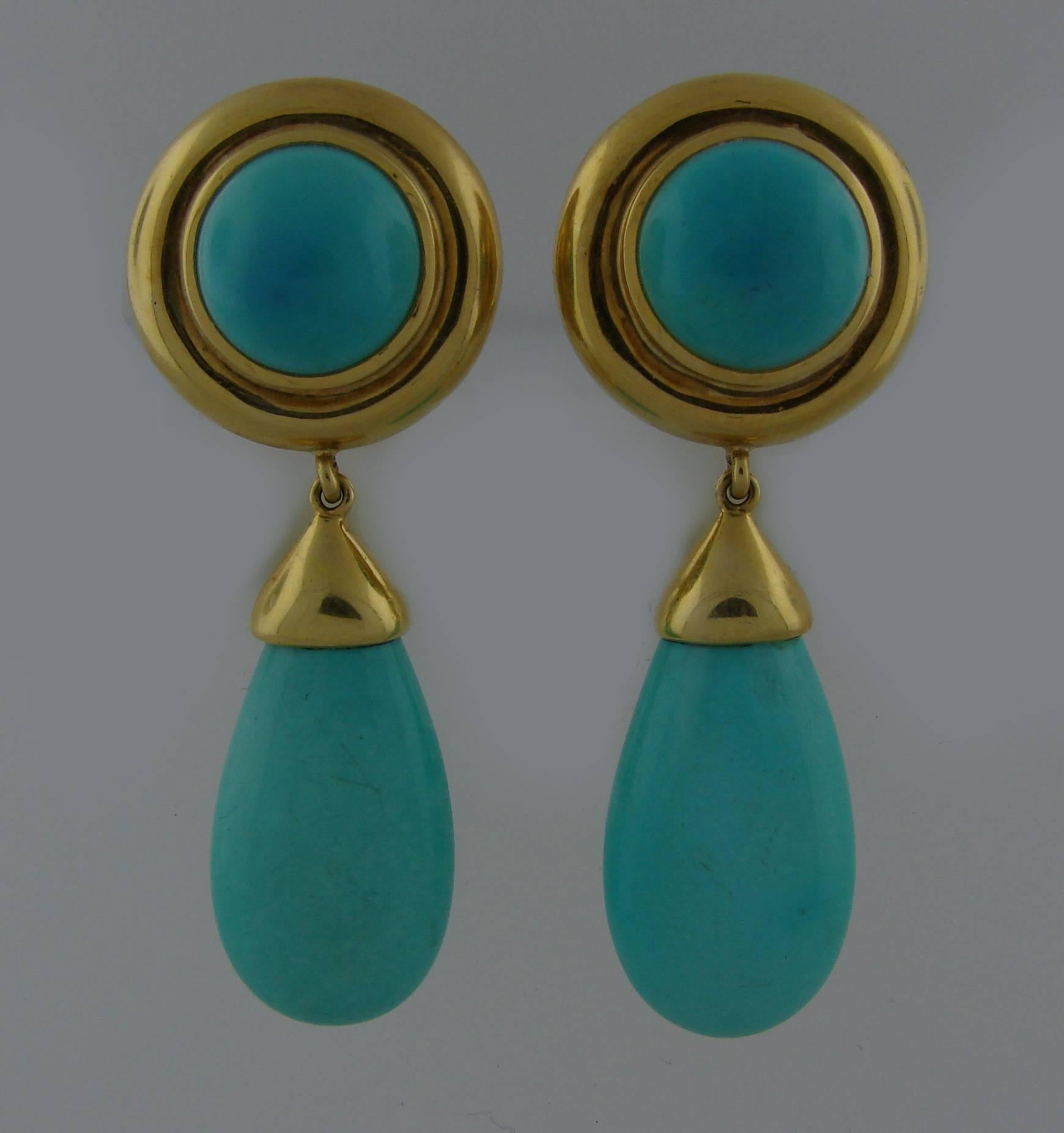 Gorgeous elegant colorful earrings created by Paloma Picasso for Tiffany & Co. in the 1980's. Feature beautiful turquoise set in 18k yellow gold.
The earrings are 2