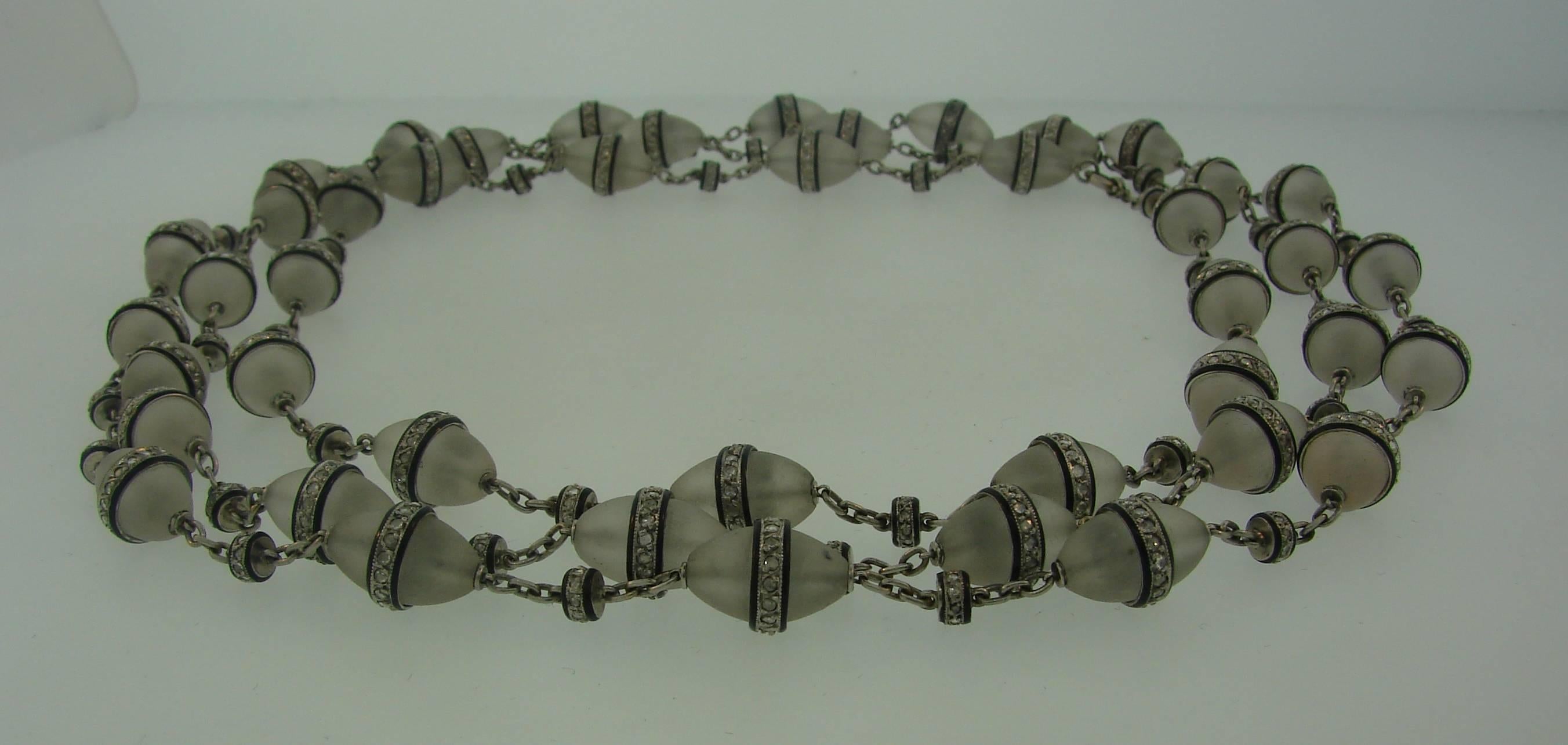 Lovely Edwardian bead necklace created in the 1910's. made of  rock crystal beads accented with black enamel and rose cut diamonds. Elegant, feminine and wearable, it is a great addition to your jewelry collection. 
The necklace is 51 inches long