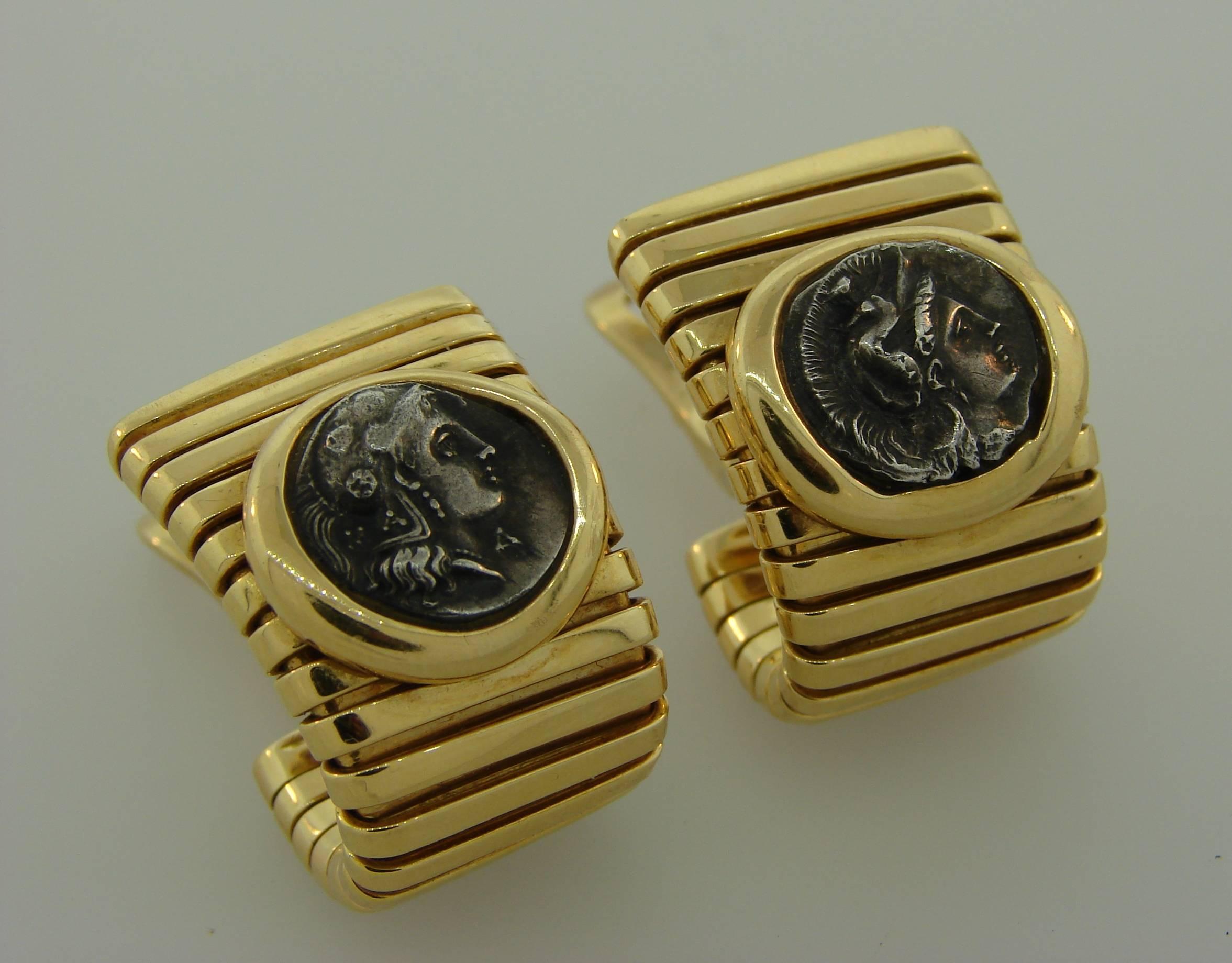 Signature Bulgari earrings featuring ancient Roman coins dated 4th century B.C.  Belong to popular and always in vogue Monete Collection. The coins are set in 18 karat yellow gold.These elegant, classy and wearable earrings are a great addition to