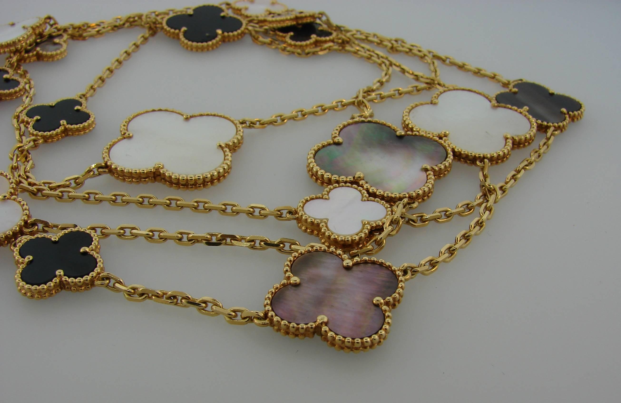 Van Cleef & Arpels Mother-of-Pearl Gold Magic Alhambra 16 Motif Long Necklace In Excellent Condition In Beverly Hills, CA
