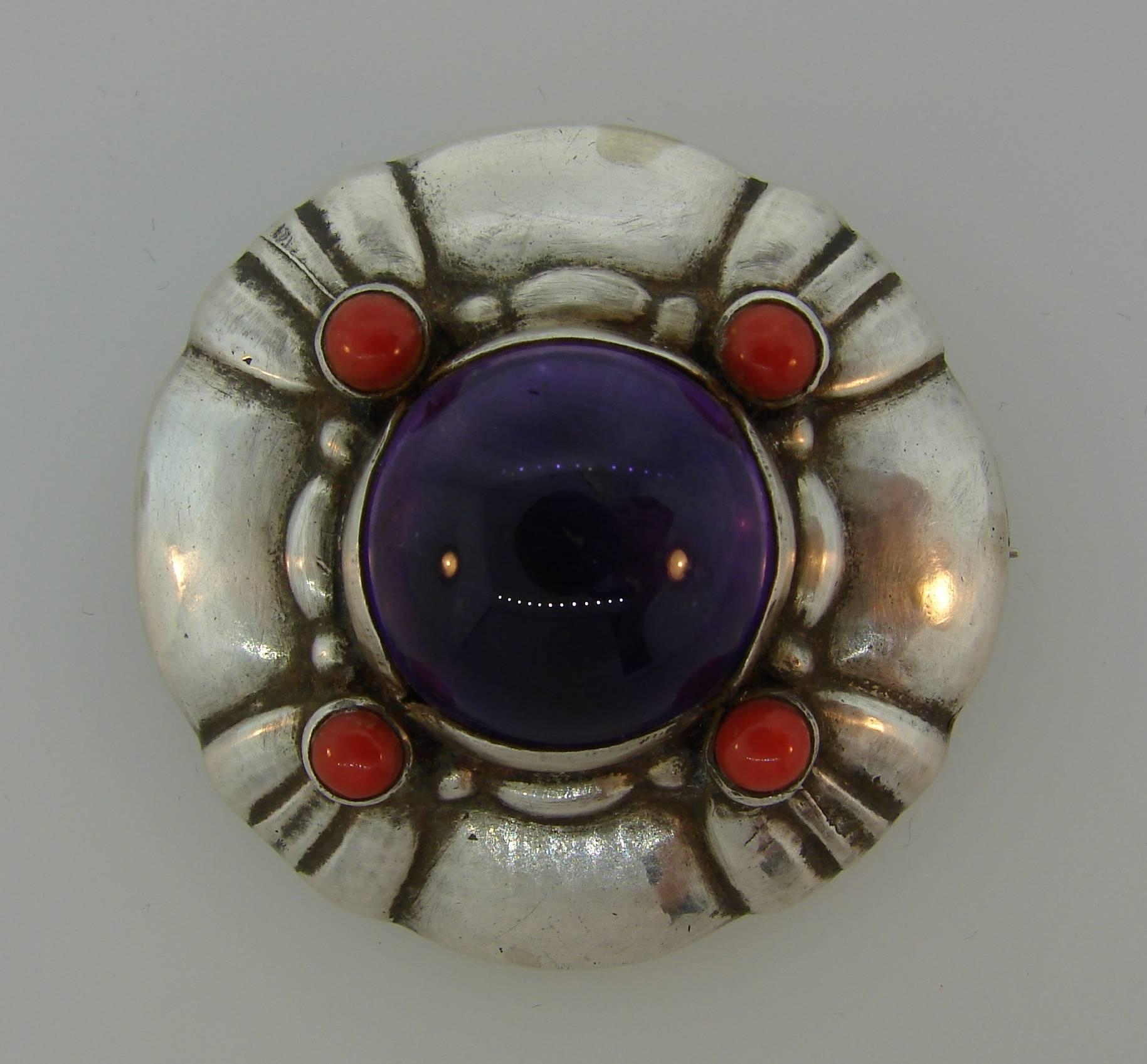 Fabulous pin created by Georg Jensen in the 1940's. Collectable and wearable, the brooch is a great addition to your jewelry collection.
It measures 1.5 inches in diameter and weighs 32.4 grams. 
Stamped with Georg Jensen maker's mark, a silver