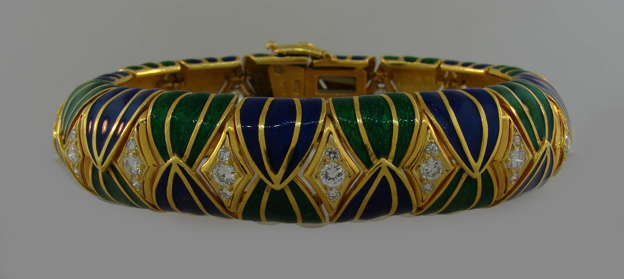 Bold and colorful bracelet created by David Webb in the 1980's.Tasteful combination of blue, green and yellow sprinkled with white diamond sparkle, three-dimensional design and volume are the highlights of this stylish piece. Wearable and chic, the