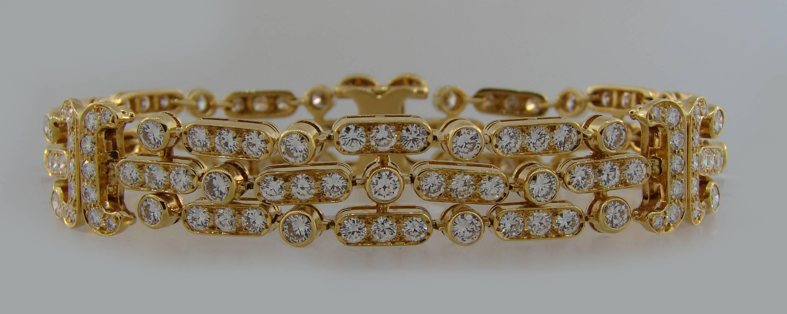 Classy and timeless bracelet created by Van Cleef & Arpels in France in the 1980's. Feminine, elegant and sparkly, the bracelet is a great addition to your jewelry collection. 
It is made of 18 karat (stamped) yellow gold and encrusted with round