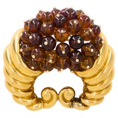 Broche de clip «Cornucopia» con citrino de Suzanne Belperron, en oro de 18k