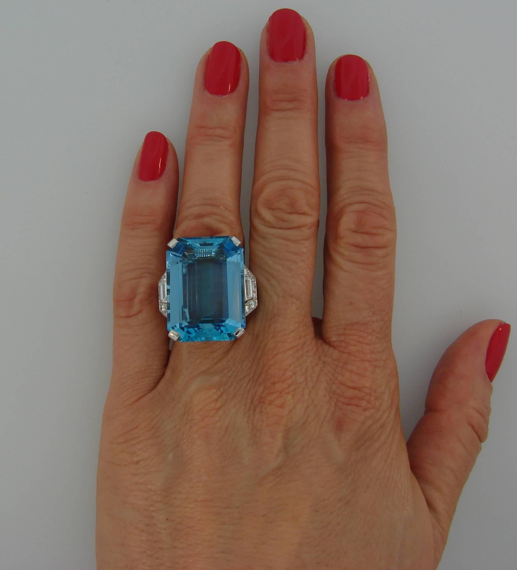 Stunning Art Deco aquamarine cocktail ring created by Asprey in the 1930's. Sensual, elegant and timeless, the ring is a great addition to your jewelry collection. 
Made of platinum, the ring features an emerald cut approximately 37-carat aquamarine