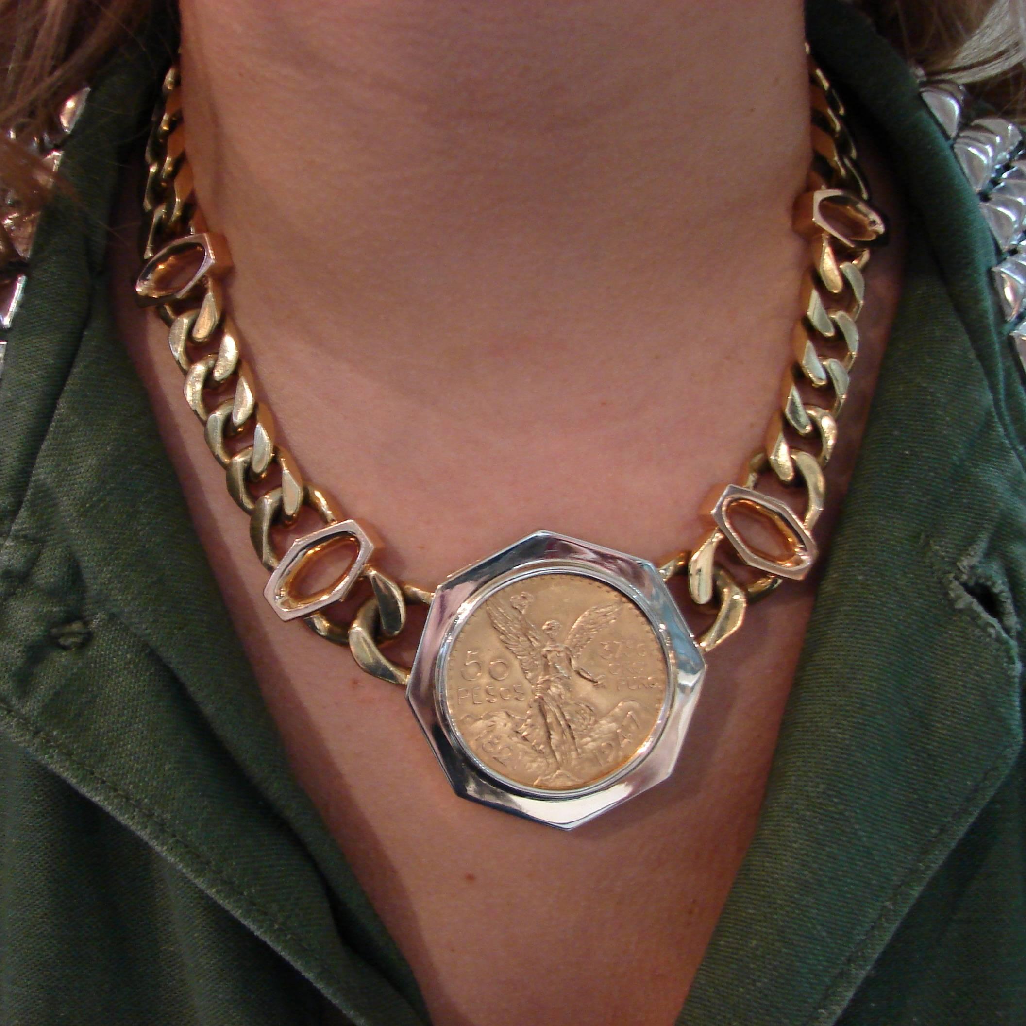 Bold necklace featuring a Mexican 50- Pesos pure gold coin. The coin is 35mm in diameter, bears a date period 1821 - 1947 and weighs 37.5 grams. Created by Bulgari in Italy. The heavy link chain is made of 18 karat yellow and rose gold, the coin