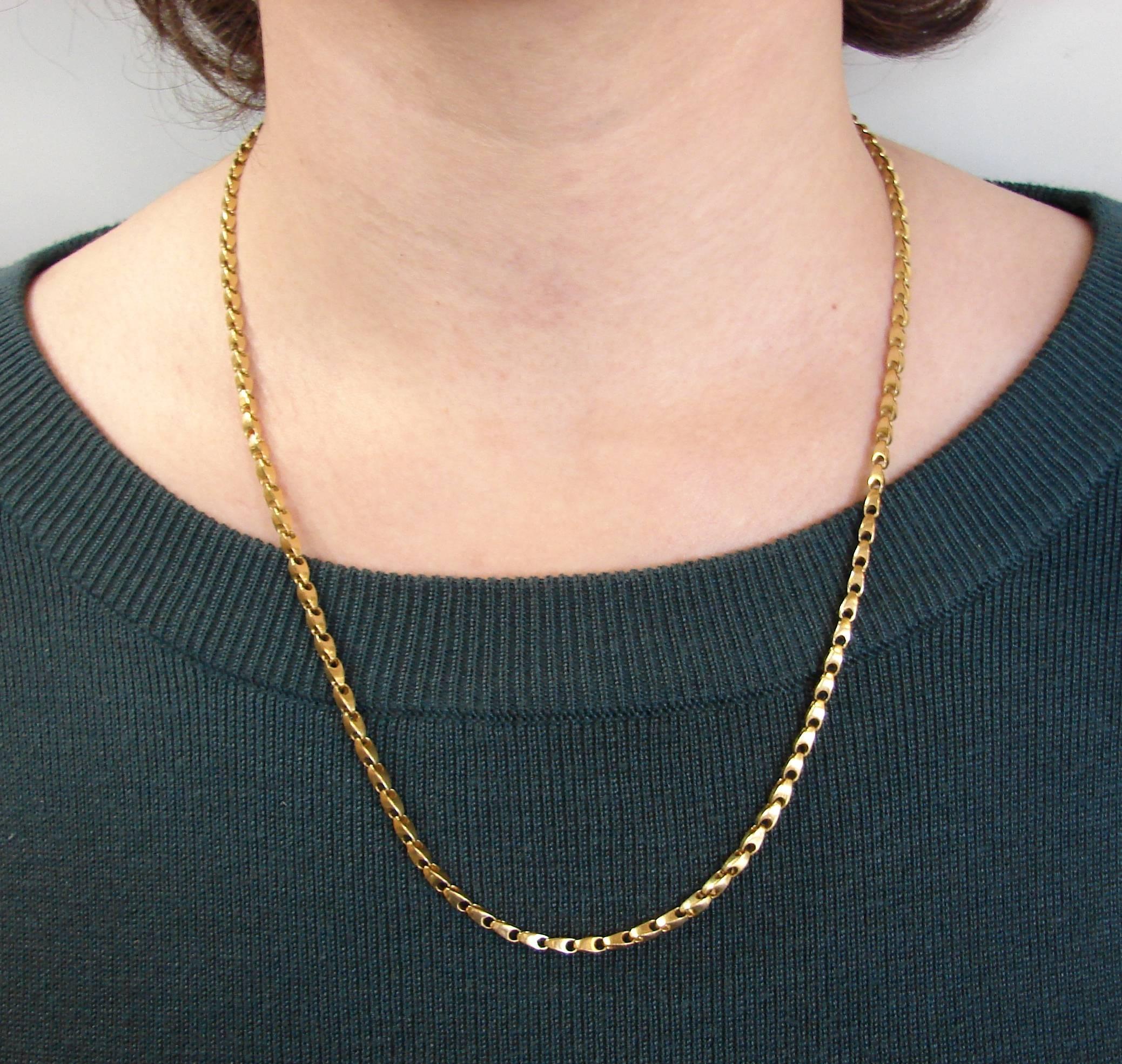 Elegant, smooth and wearable chain necklace that is a great addition to your jewelry collection. It was created by Cartier in the 1970s. 
The necklace is made of 18 karat yellow gold. 
It is 22-1/2 inches (57 cm) long and slightly under 1/8 of an