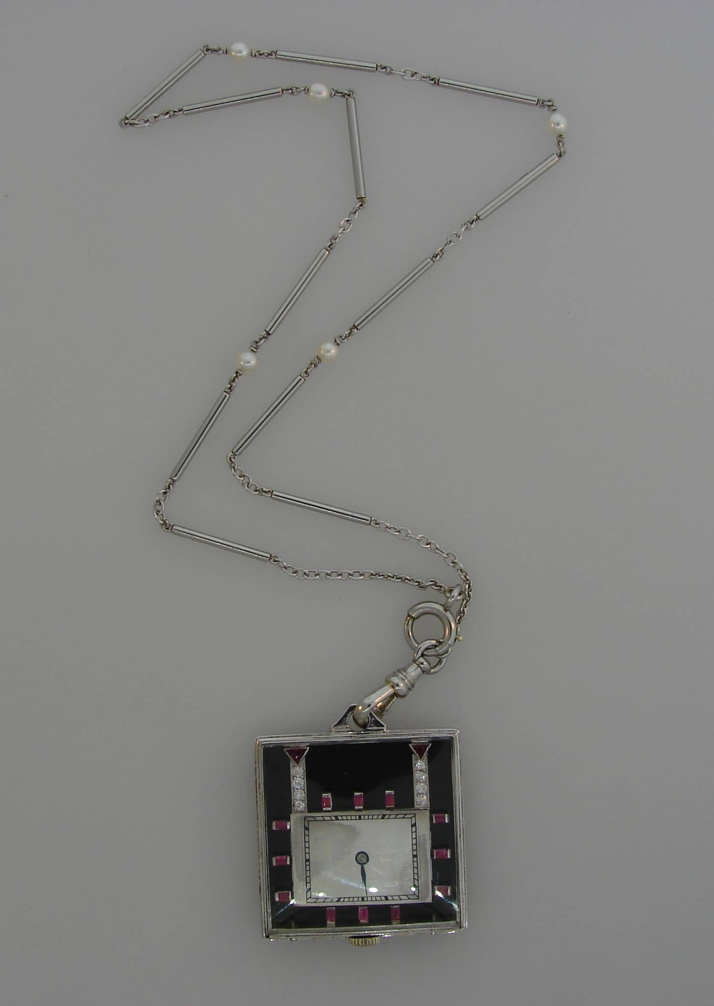 Platinum Diamond Ruby Black Onyx Pearl Pendant Watch Necklace, 1950s In Good Condition In Beverly Hills, CA