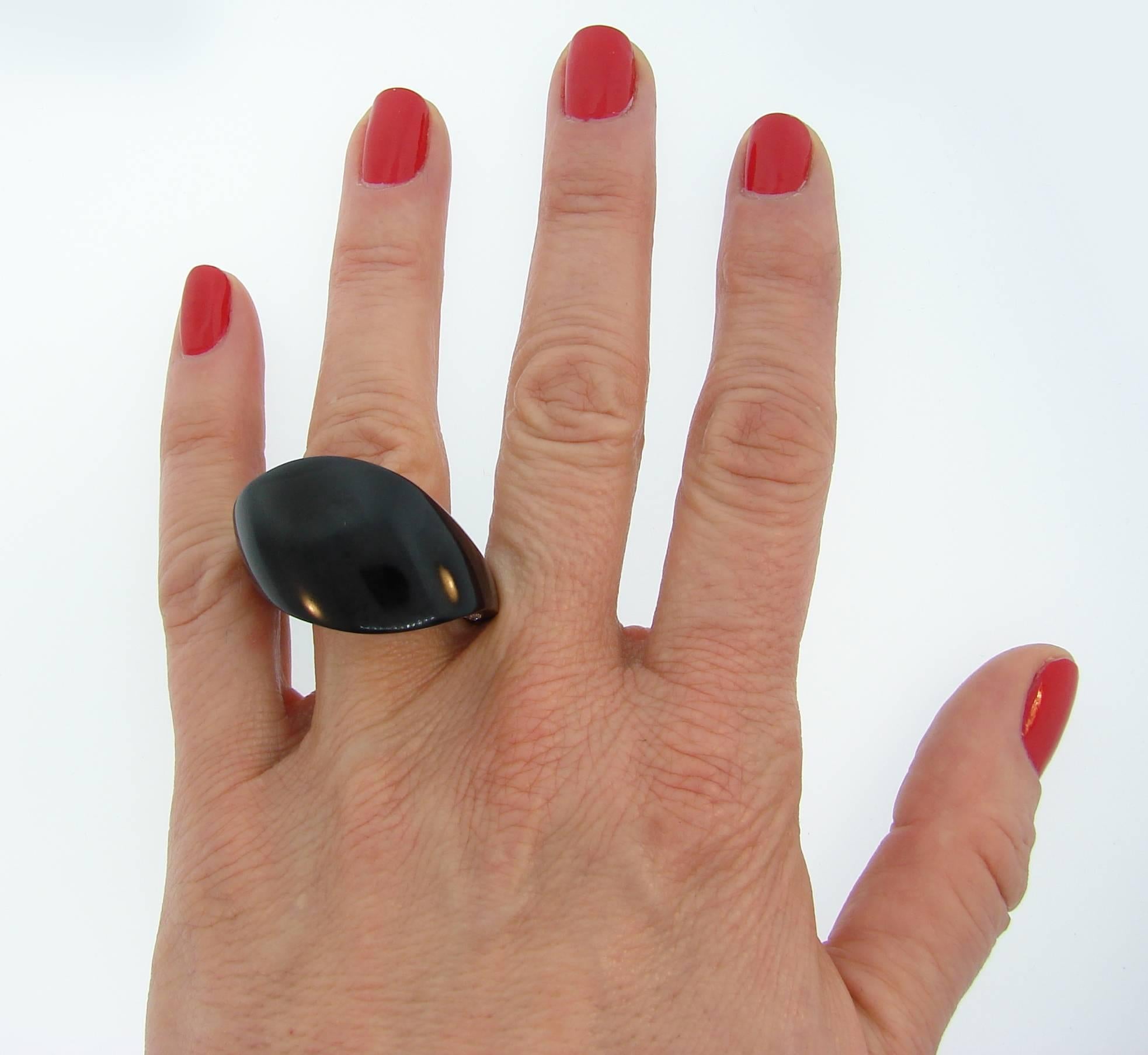Stunning cocktail ring created by Italian jewelry House Vhernier. Beautiful shape, perfect lines, contrast of white sparkle of diamonds with sleek black jet are the highlights of this chic ring. Bold yet wearable, the ring is a great addition to