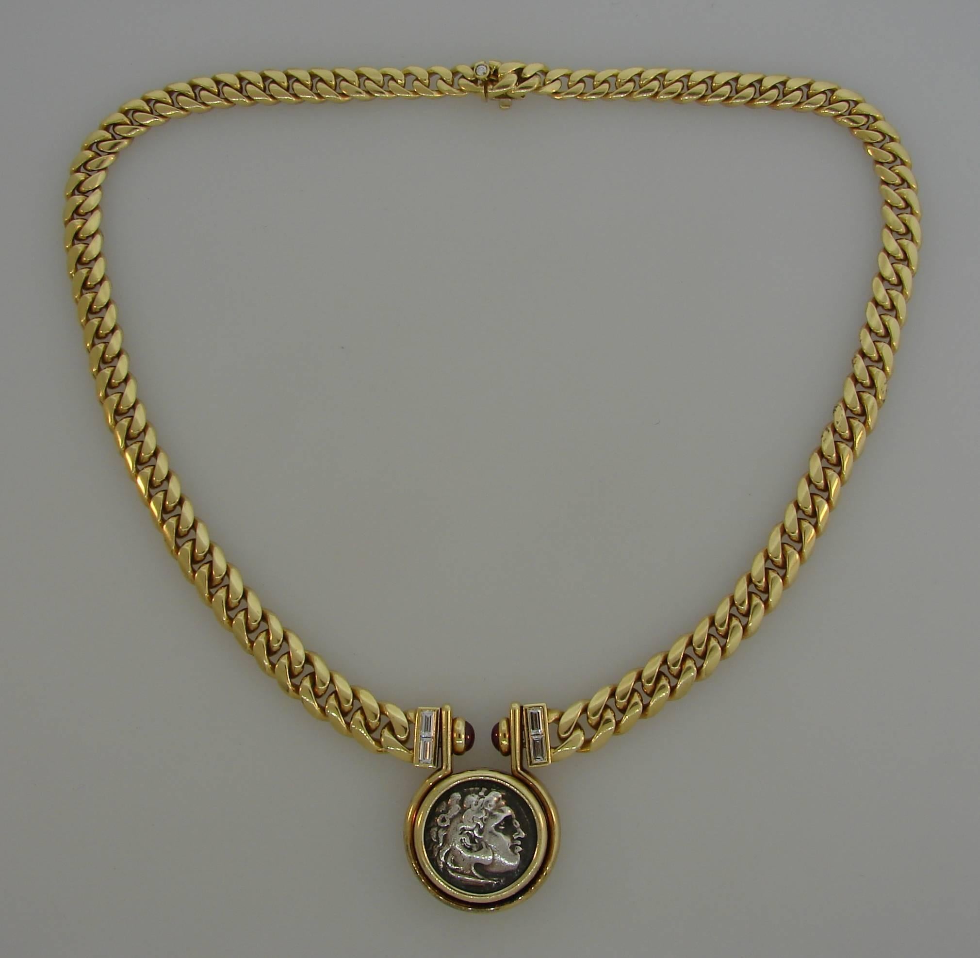 Signature Bulgari coin necklace with an ancient Roman coin dated 336-323 AV. J.C. The coin is a silver drachme with Alexander The Great profile. Bold, elegant and wearable, the necklace is a great addition to your jewelry collection.
The necklace is