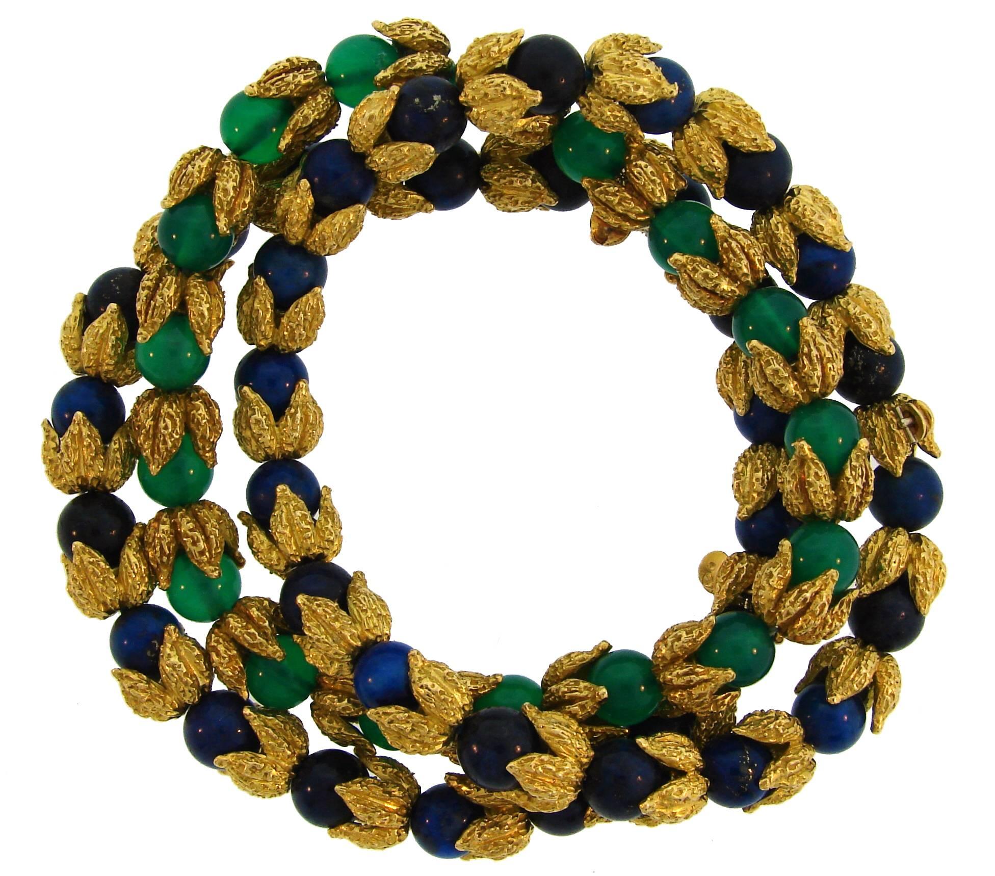 Chic and colorful trio of bracelets created in France in the 1970's. Wearable and fun, they are a great addition to your jewelry collection. 
Two bracelets are made of 18 karat yellow gold and sodalite and one is made of 18 karat yellow gold and