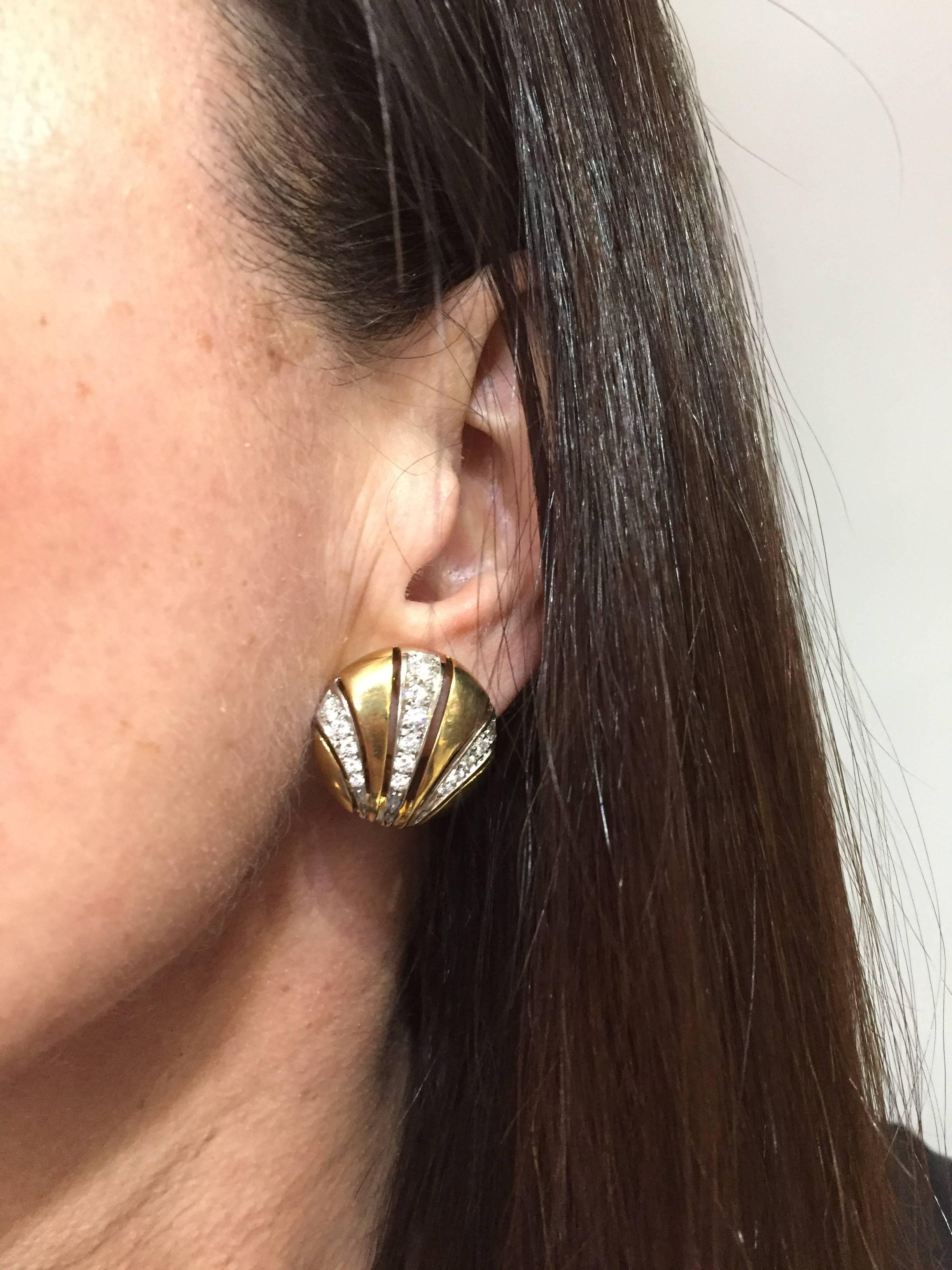 Classy and timeless ear clips created by Van Cleef & Arpels in the 1980s. 
Feminine, wearable and French chic, the earrings are a great addition to your jewelry collection.
Made of 18 karat yellow and white gold and set with round brilliant cut