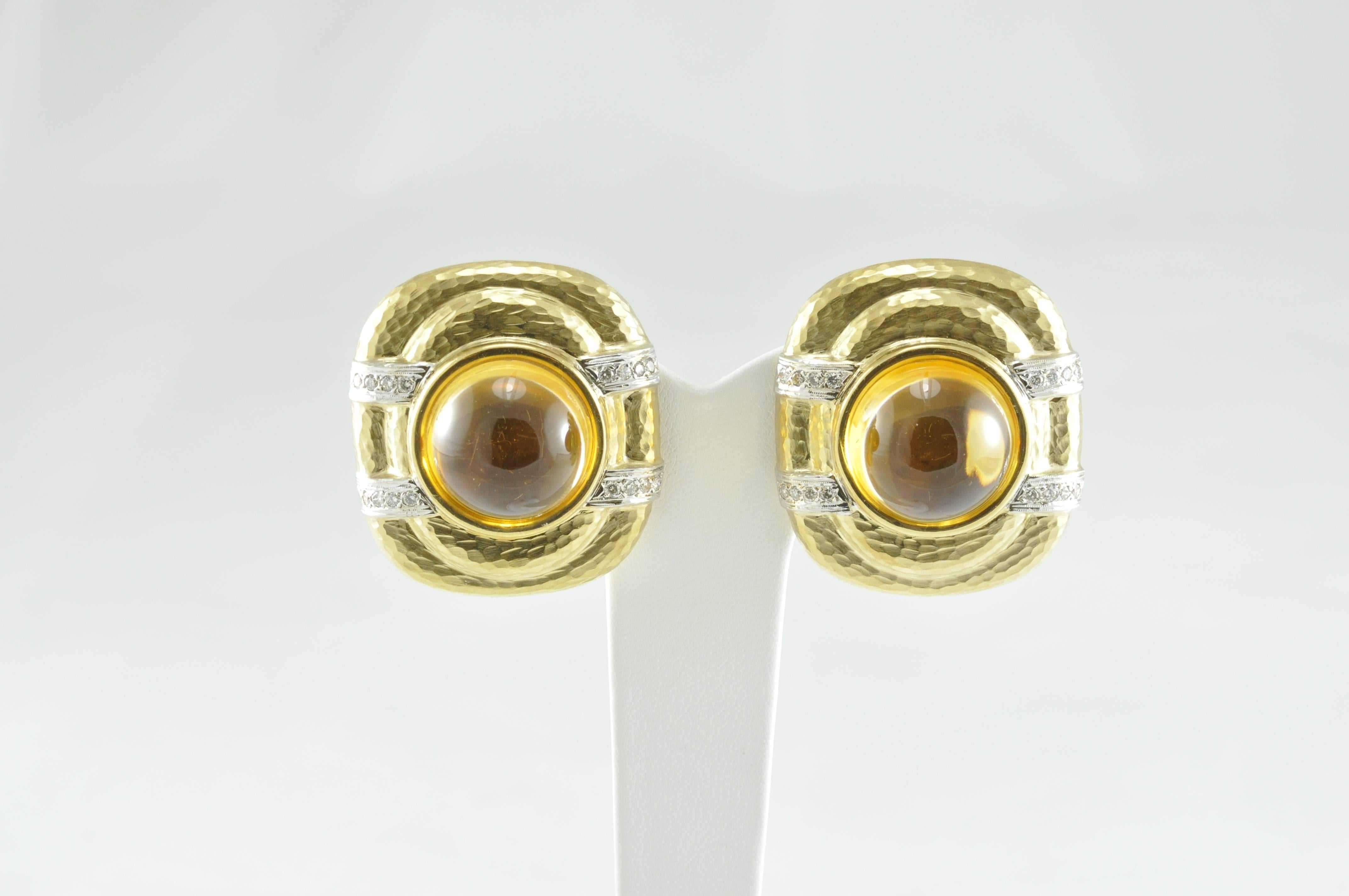 18k Yellow Gold Oval Citrine earrings with 16 diamonds (4 rows of 4) each. Earrings are stamped 18k, as well as ANF.

Clip Earrings.  .80cts Diamonds.  