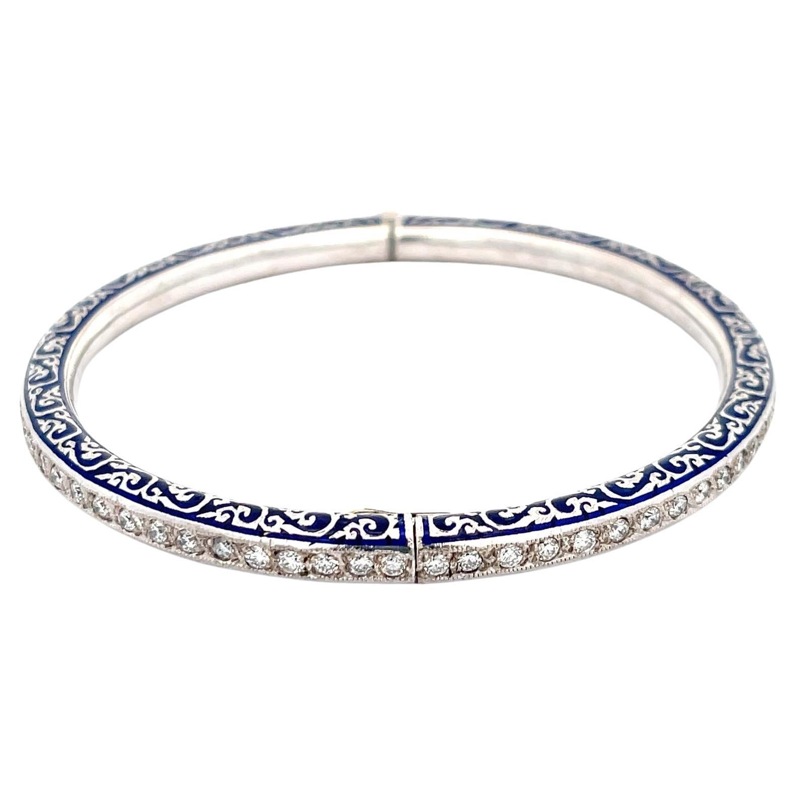 Blue Enamel & Diamond Bangle 18K White Gold. The bangle features approximately 2.16ctw of round diamonds, H color, SI1-I1 clarity. 
5.40mm wide
25 Grams