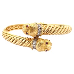 Pulsera Bypass Cabezas de León Oro Amarillo 18K