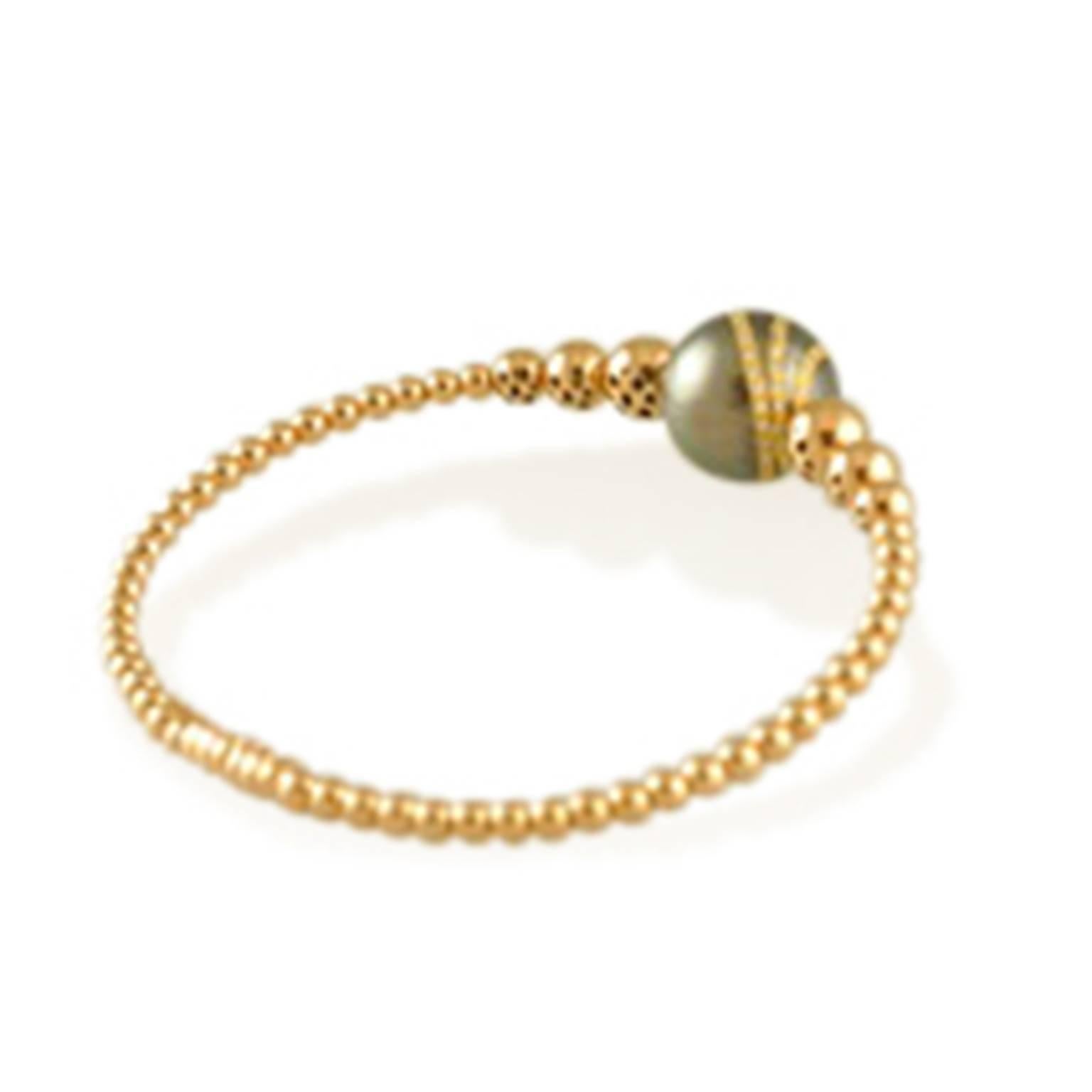 18K Rose Gold 13.5mm Black Tahitian Pearl and full cut diamond bracelet.  .28cts diamonds and This bracelet has .28CTW Diamonds 

Italian Design