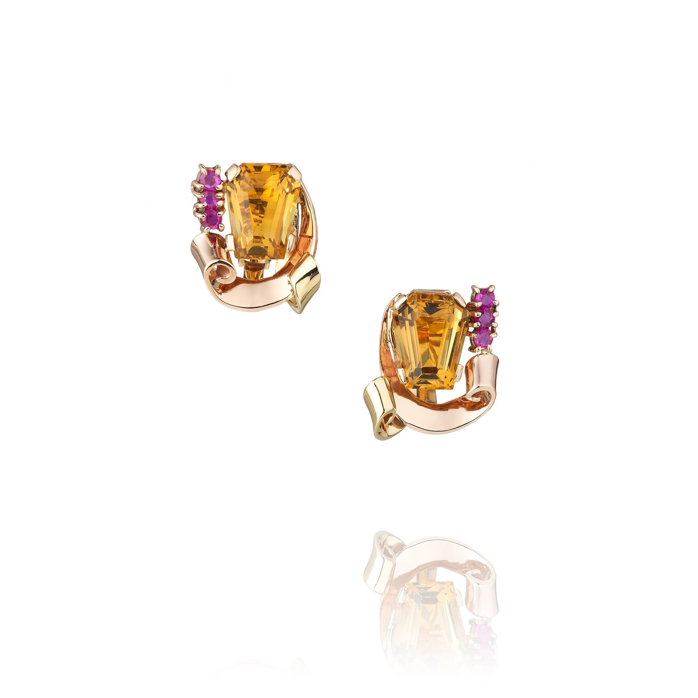 Brooch:  121.75 carat Emerald Cut Citrine in 14k Yellow and Gold with Rubies and Diamonds.  Florentine Finish.  Condition is very good.  Color:  033-medium light orange.  Clarity:  VS, Eye Clean 2.  cut:  Very Good.  
Citrine measures 32x24.78x.16. 