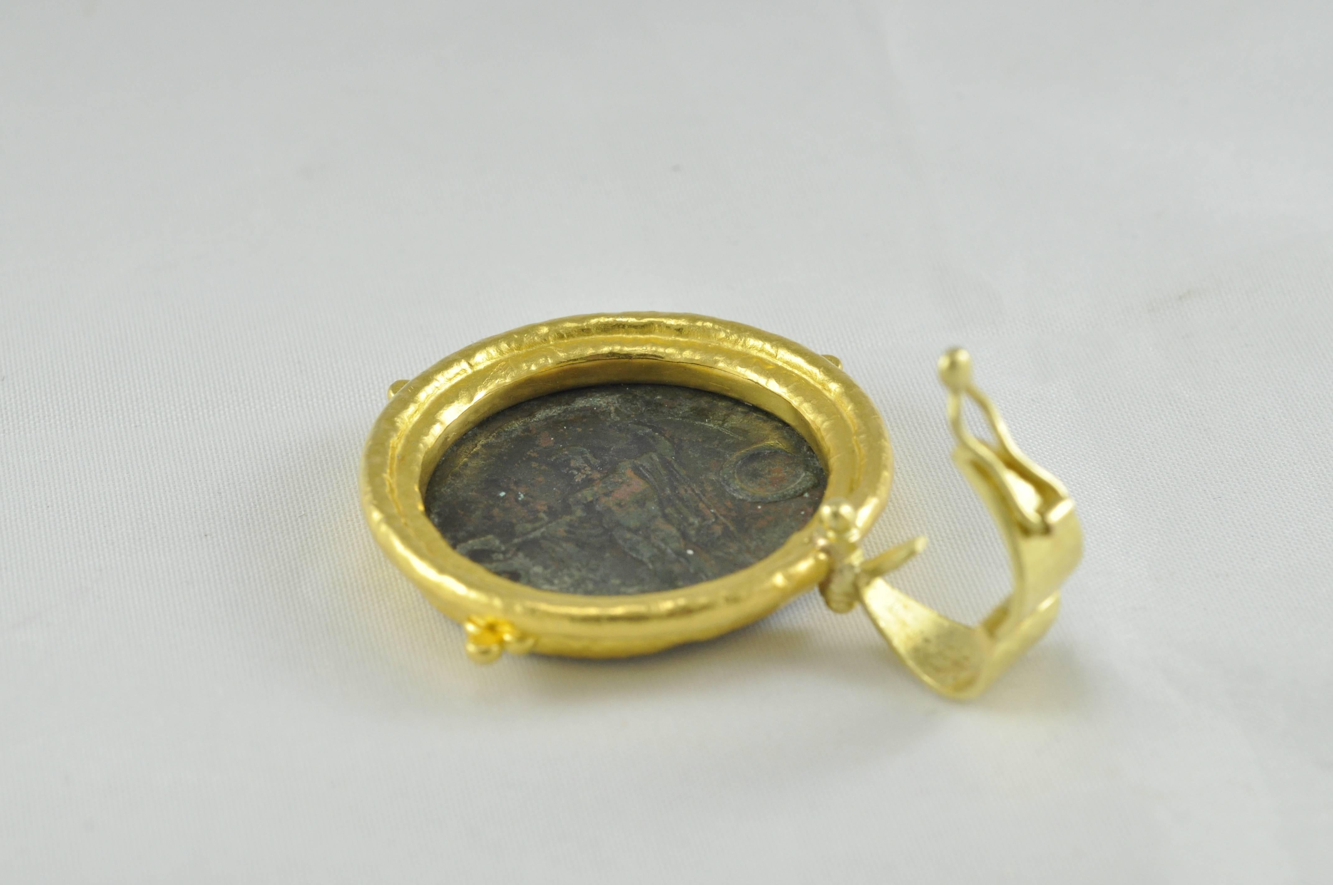 Imagine. The first person to have touch this coin lived 2000 years ago! Wearing this pendant is wear history. The Roman Coin from the time of the Julius Caesar, dating between 37-41 AD, is set into a worthy 24K Yellow Gold Pendant.   

Coin is Head