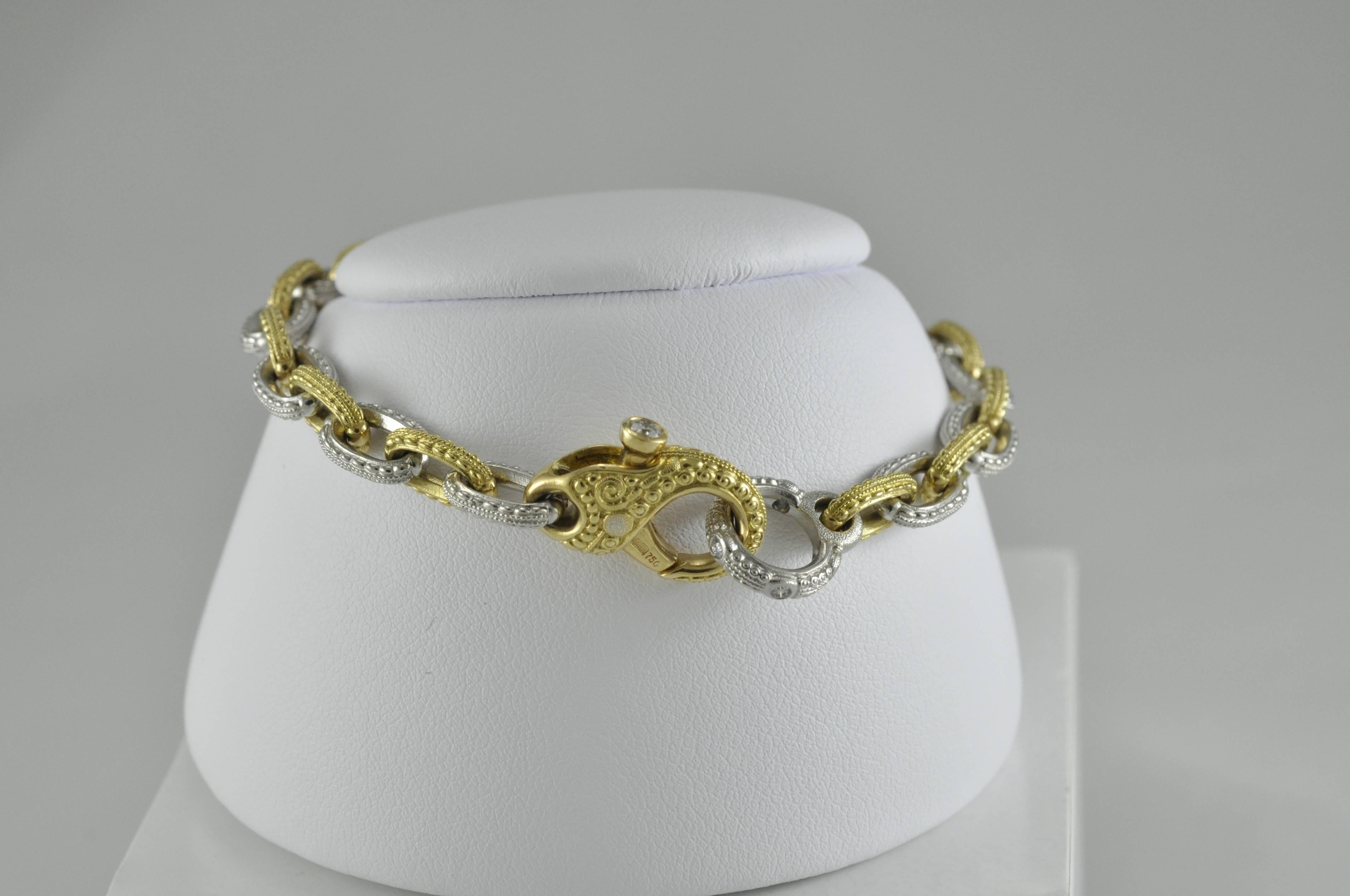 .17CTW Diamonds 8 inch long bracelet.  18K Gold and Platinum 2 tone bracelet from Alex Sepkus with Lobster Clasp.  Alex Sepkus nautical style combination platinum and gold link style bracelet with lobster style 18kt. textured gold clasp. It should