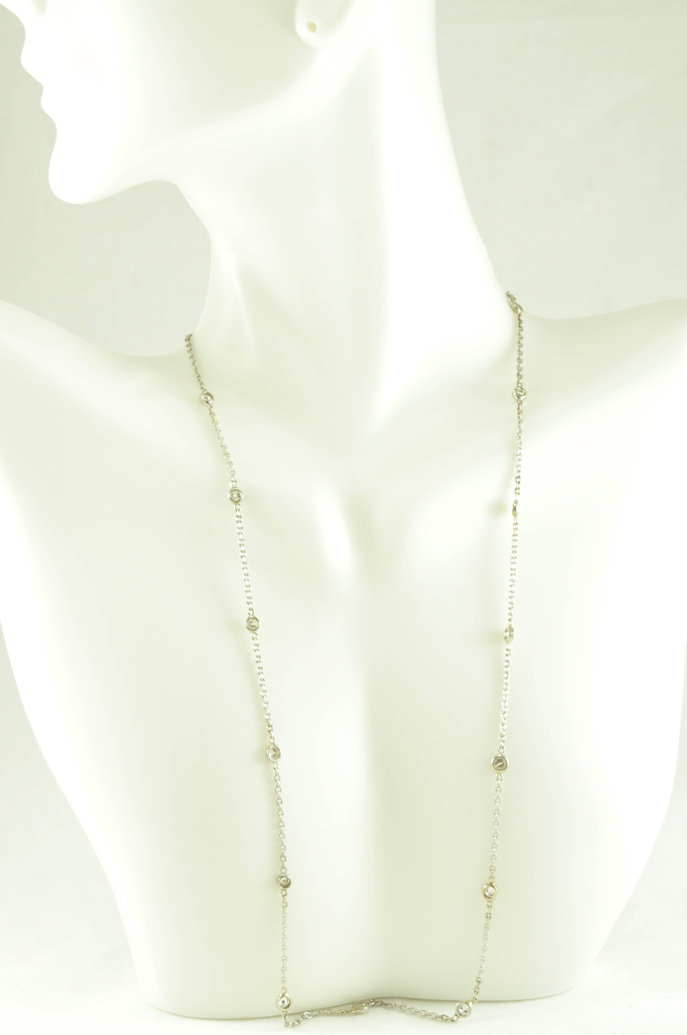 Bezel Set Diamond Necklace in 14K White Gold.
17 inches long with .97CTW with 16 Bezel Set Diamonds.