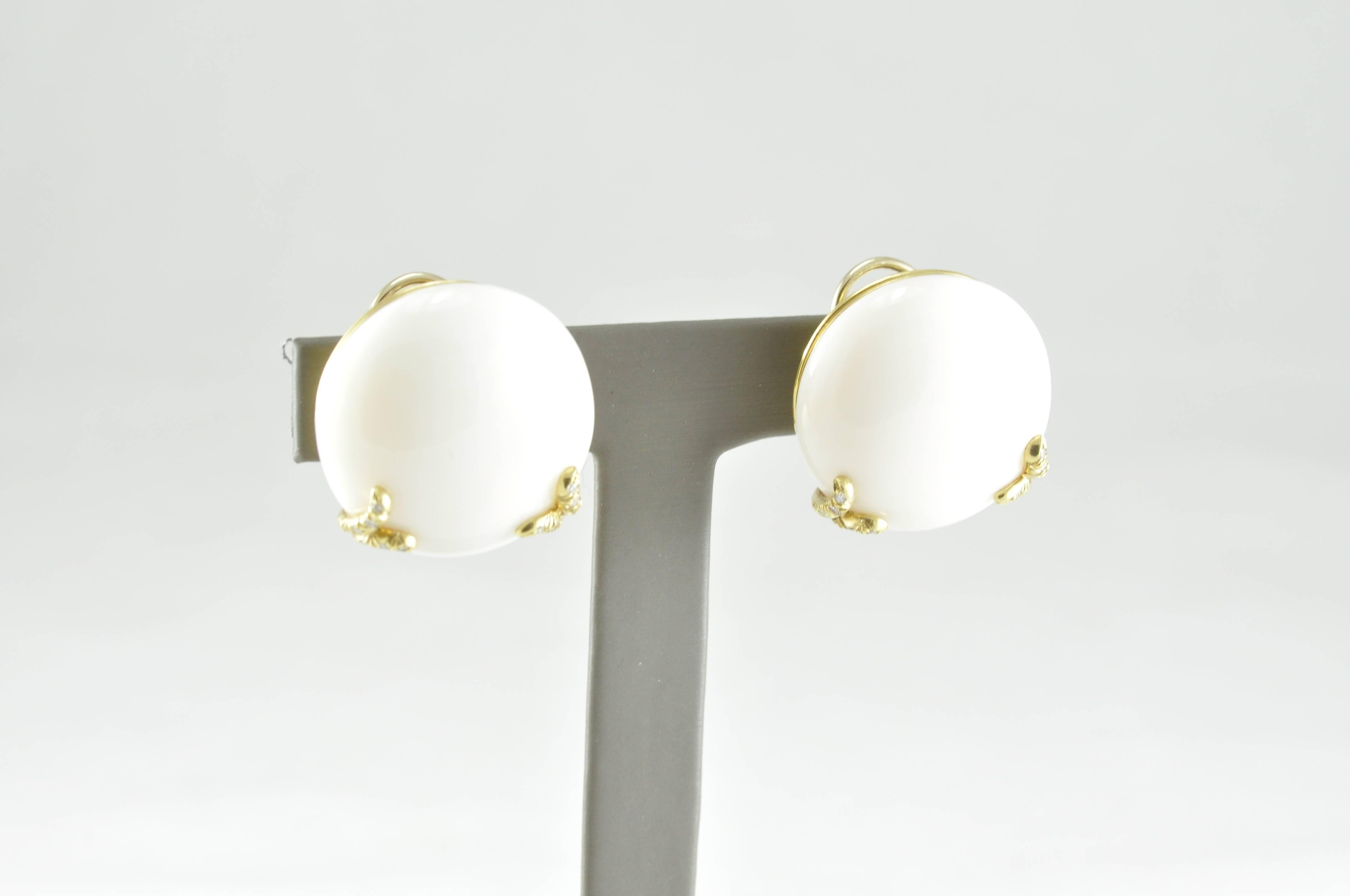 Exquisite Henry Dunay White Coral Earrings in 18k Yellow Gold featuring 0.36ct round Diamonds. These shining examples of Dunay's quality and craftsmanship are also fabulous investment pieces, as his notoriety continues to grow within the