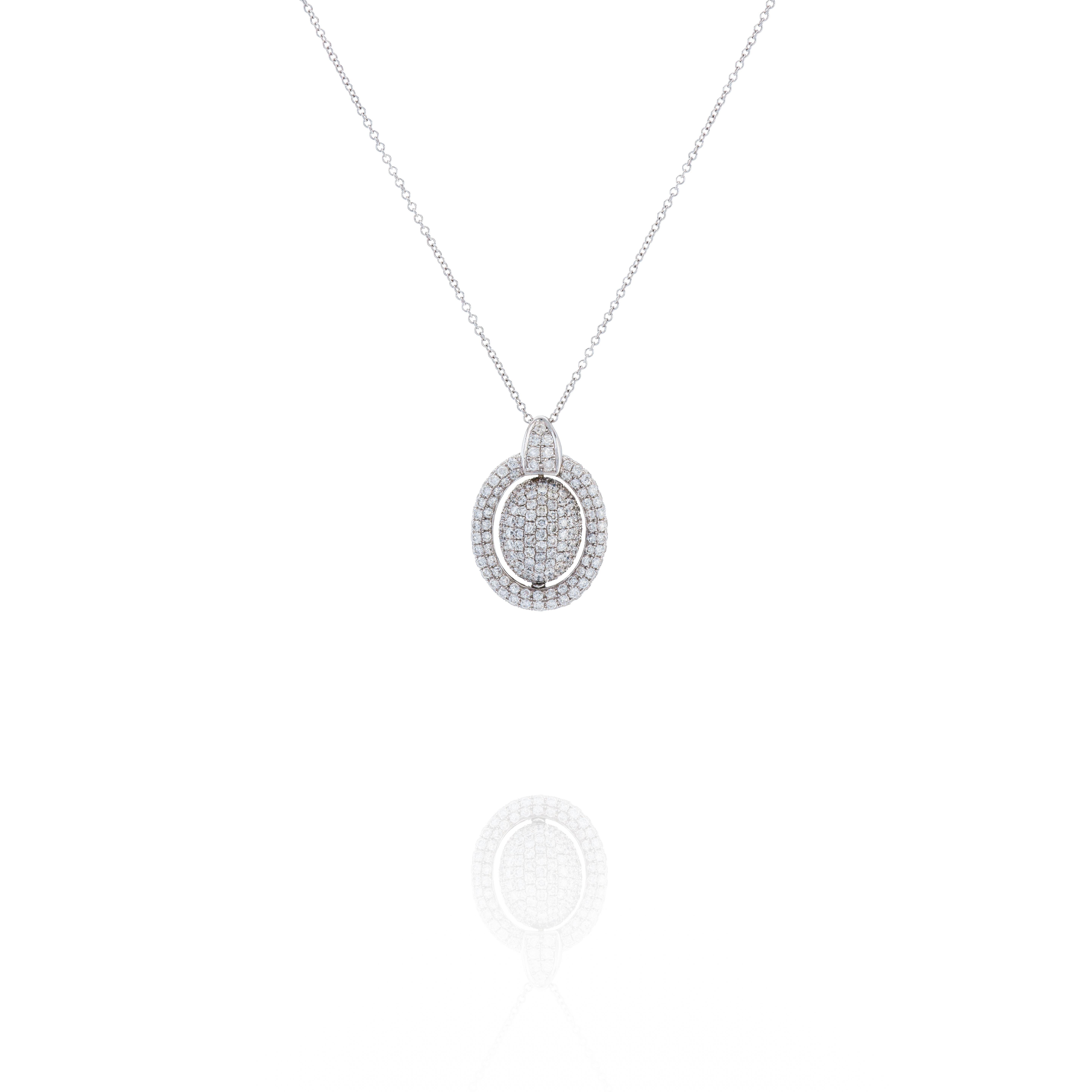 18k White Gold with White and Black Diamonds on chain with 3.45ct total diamond weight.  Made by Acclaimed Designer to the Stars-DVANI!!!  Pendant flips from white to black. 
On 18 inch 14k White Gold Cable Chain.