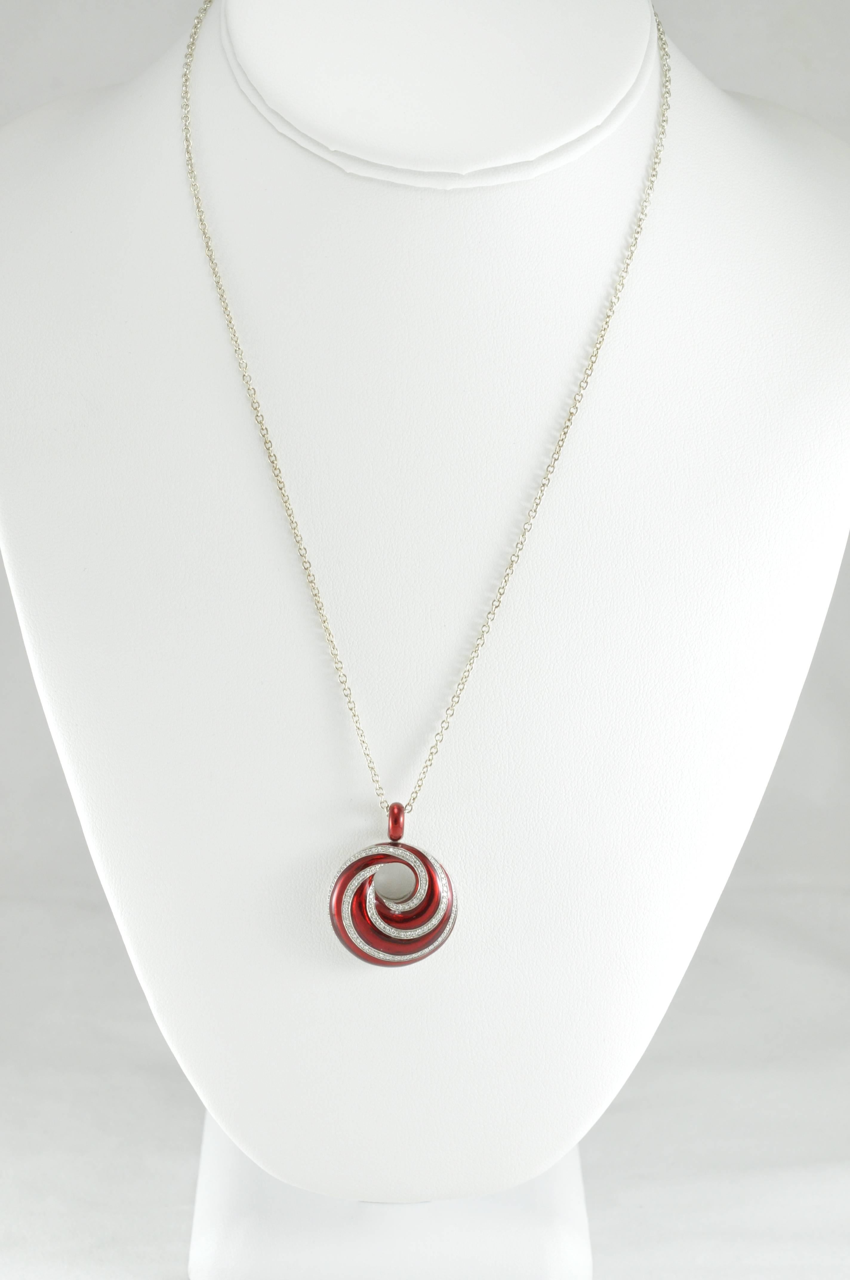 Sterling Silver Necklace with a .65ctw Diamond Enamel Swirl
18 inch chain

Italian Design 
