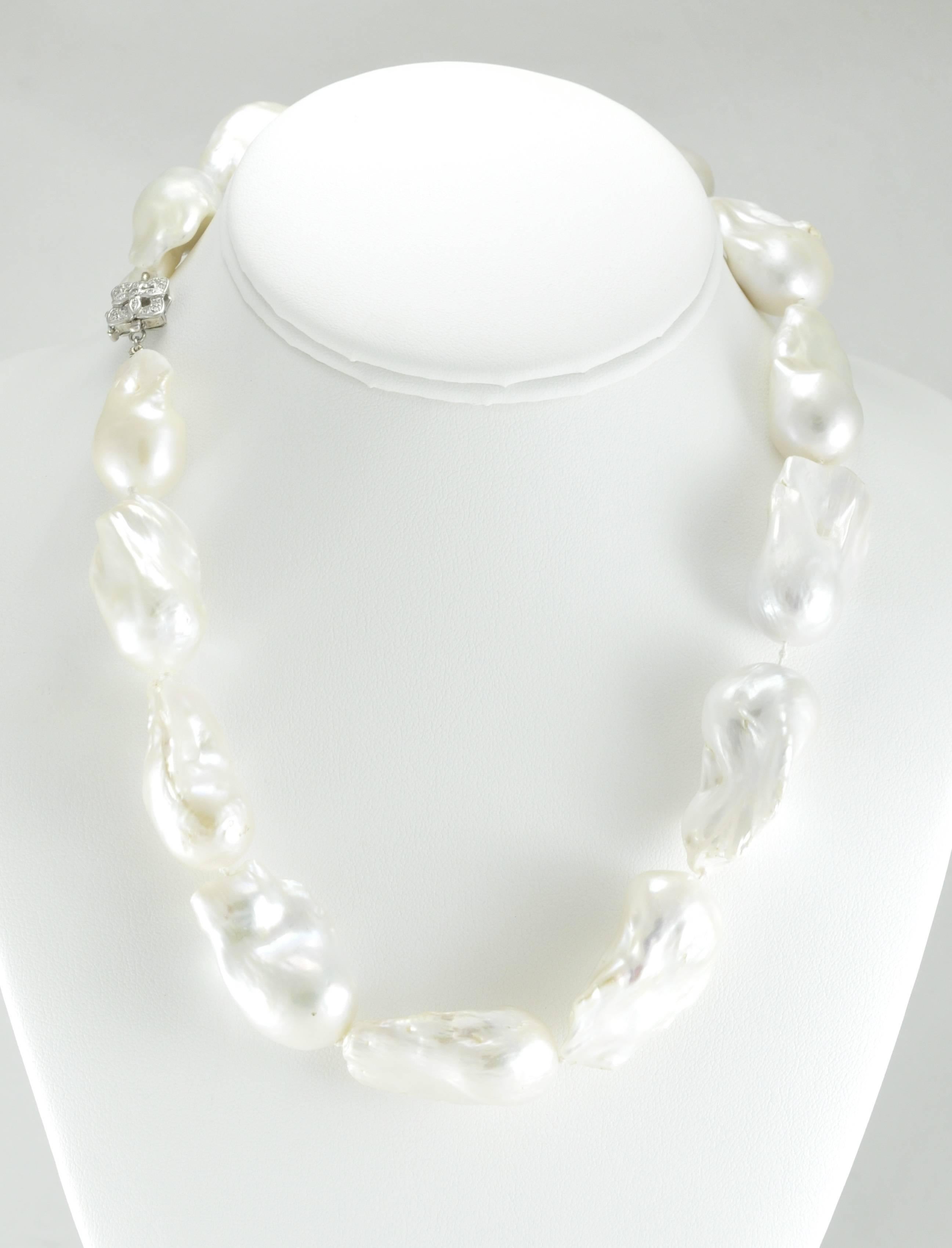 Baroque Pearl Necklace 18 inches with .2CT Diamonds in a 14K White Gold Vintage Clasp
Pearls vary in size but are approximately .75 inches wide by 1.25 inch long.
