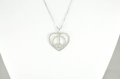 Collier de diamants Love and Peace