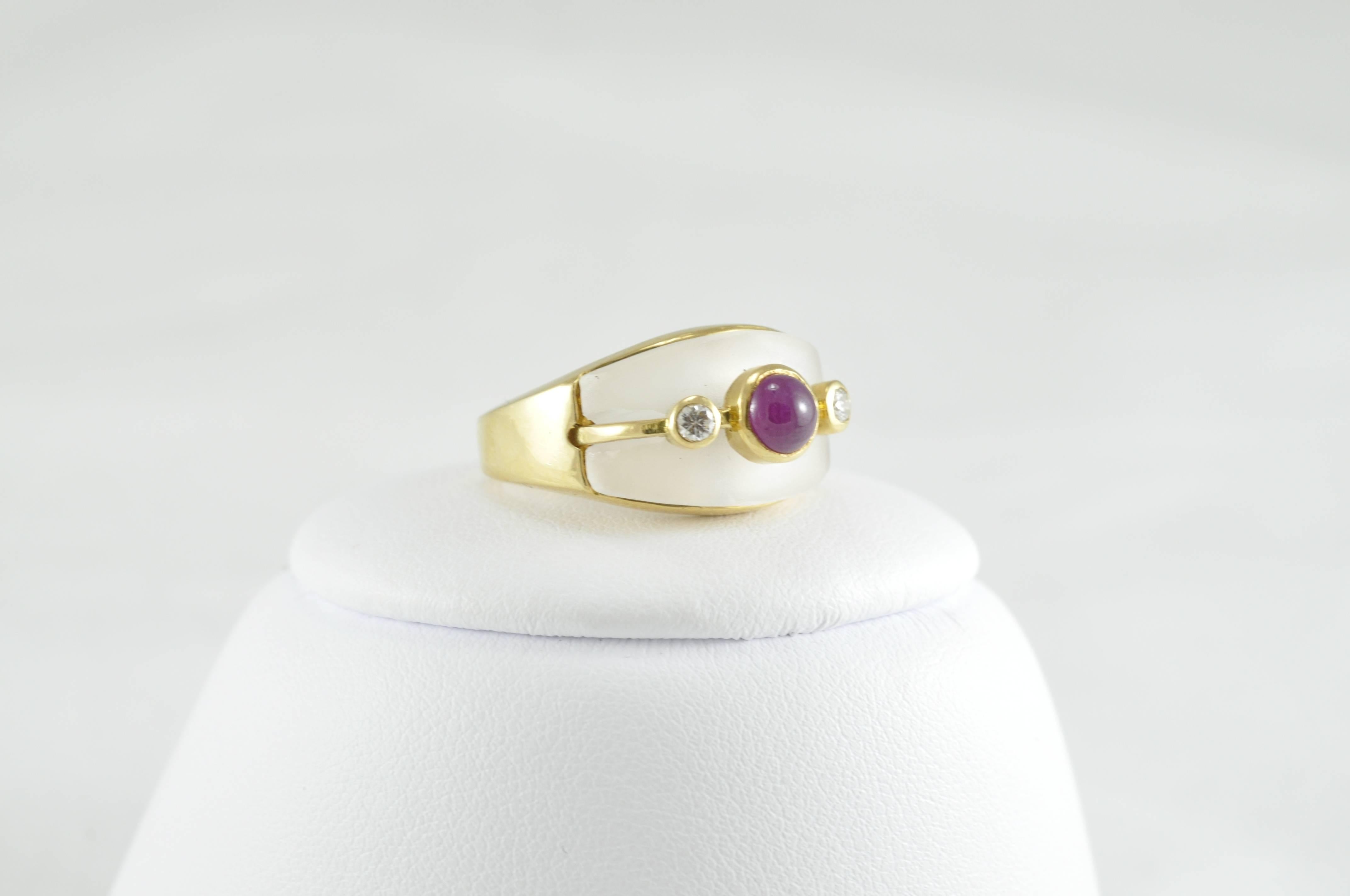 18k Yellow Gold LaLaounis Cabochon Ruby Ring with frosted crystal and two Round Diamonds.
The ring is stamped A21750 and GREECE with a trademark stamp.
The item is currently just on the small side of size 6.75, but can be sized to fit your needs.