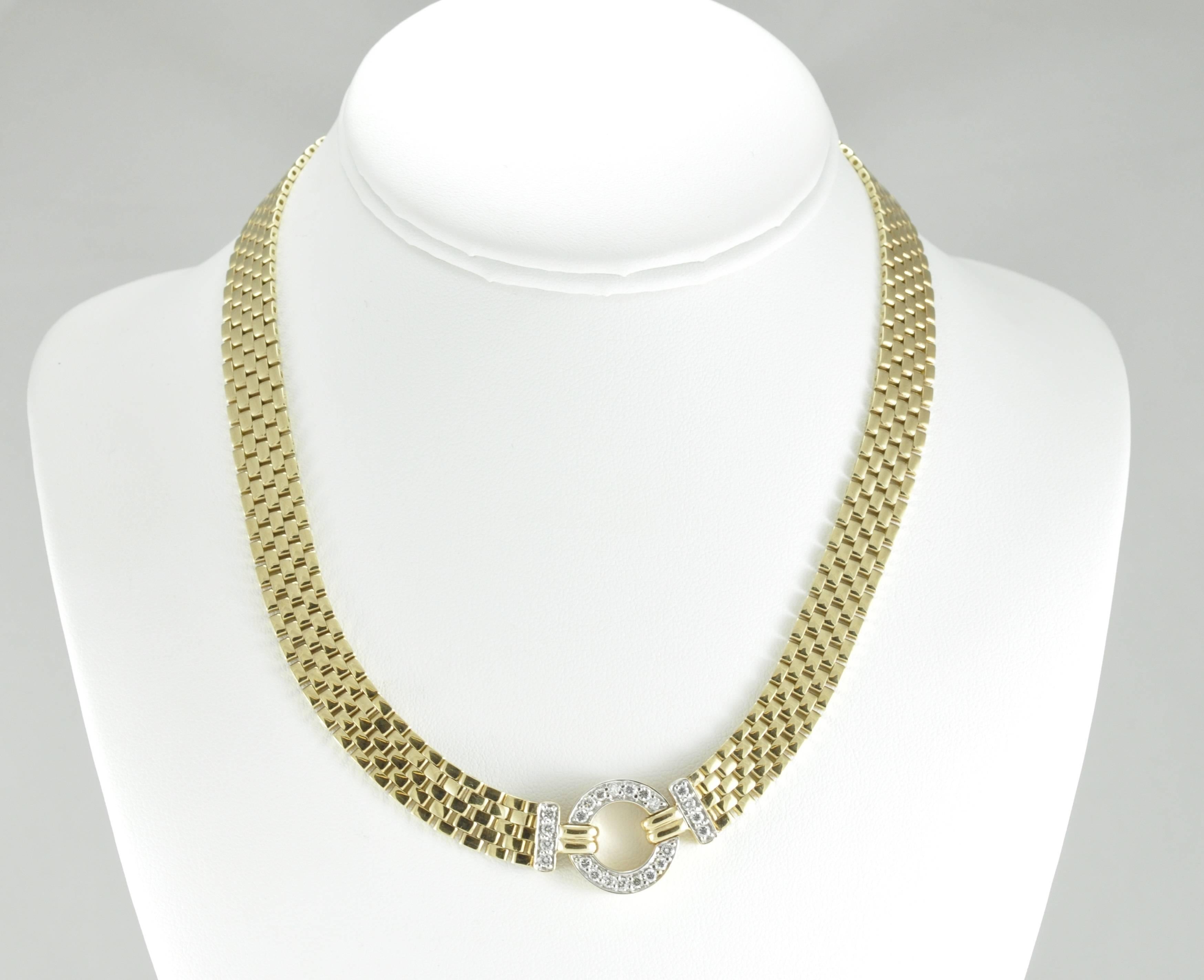 14k Yellow Gold Woven, Panther style necklace featuring 1.1ctw Diamond Circle. 
The necklace clasp is stamped ITALY and 686. This item measures 16 inches in length.