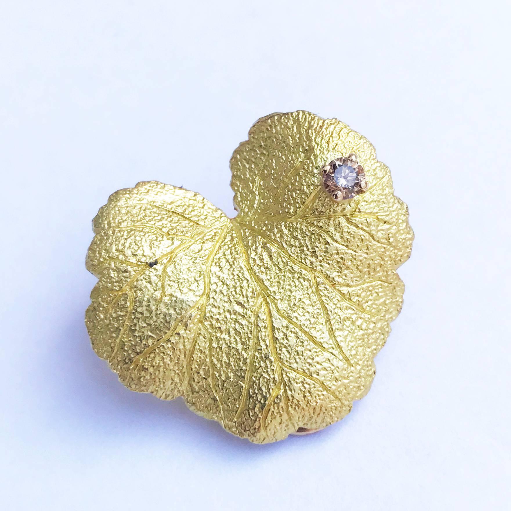 Designed by Andrew Grima in 2004
A pair of 18ct. yellow gold and brown diamond earclips in the form of geranium leaves. 
Signed GRIMA, 750

About Grima
Andrew Grima was one of a handful of British designers who revolutionised jewellery in the early