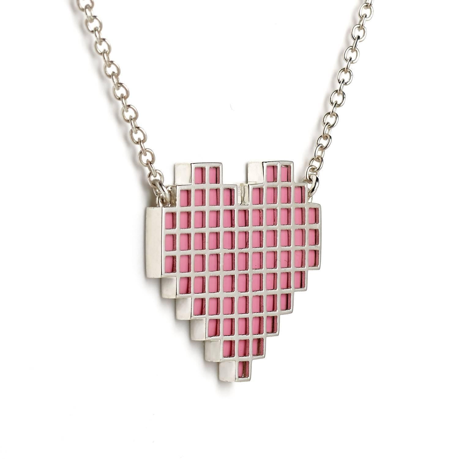 Silver and enamel reversible Pixel Heart necklace by Francesca Grima

Silver set with Enamel on Silver chain

・Polished Silver
・Reversible Bubblegum/Carbon Enamel
・Pendant length: 2.2cm
・Pendant width: 2.2cm
・Chain can be worn in three lengths: