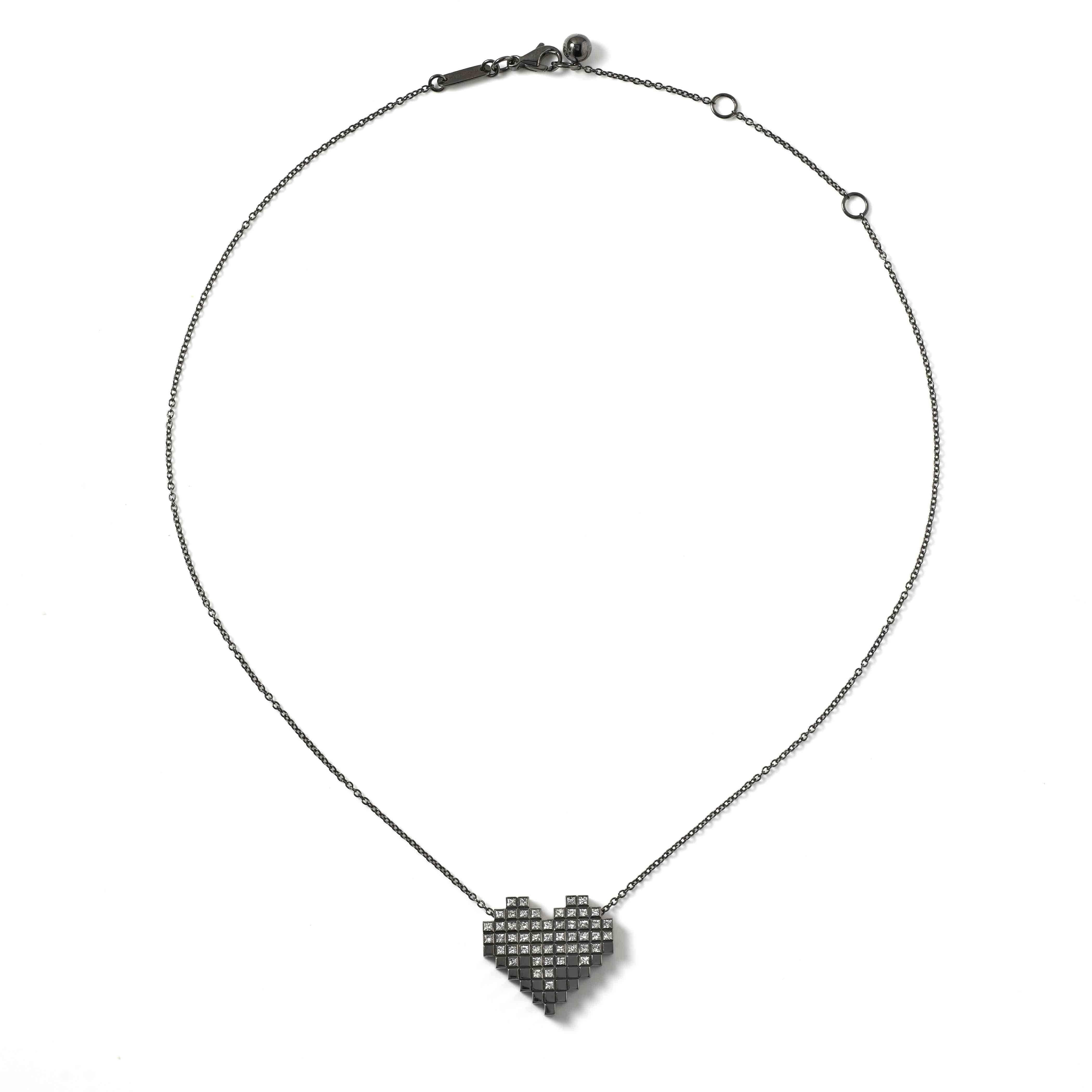 Black Gold and Diamond Pixel Heart Necklace by Francesca Grima 

18ct. Black Gold set with Diamonds on Black Gold Chain.
・51 Princess-cut Diamonds (0.63cts)
・Polished 18ct. Black Gold
・Pendant length: 2cm
・Pendant width; 2.1cm
・Chain can be worn in