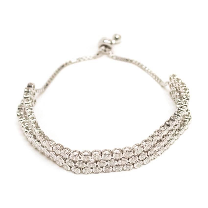 Bespoke white gold triple row diamond tennis bracelet. It features a slide toggle, so the length is fully adjustable.

White gold - 18ct

Diamond - 6.50ct

Diamond colour - G/H

Clarity - SI 2

All items come with a valuation certificate.

Made by a