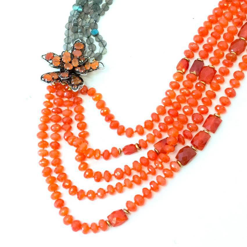 Iradj Moini orange and grey beaded necklace with moonstones and flower charm.
Great condition 9.5/10

Measurements Approx:

Length 54cm
