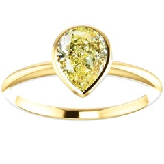 Hugo 
Haan Gold GIA Certified Pear Yellow Diamond Bezel Engagement Ring