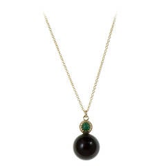 Black Onyx Bead with Emerald Cabochon in 14k Yellow Gold