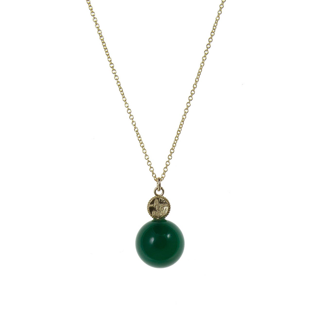 Green Onyx Bead with Ruby Cabochon set in 14k Yellow Gold.
Created and Designed by Amyn The Jeweler.
Made in USA

Also available with Blue Topaz, Peridot, Citrine, Black Onyx, Pearls, Amethyst, Garnet, Emerald and Sapphire.