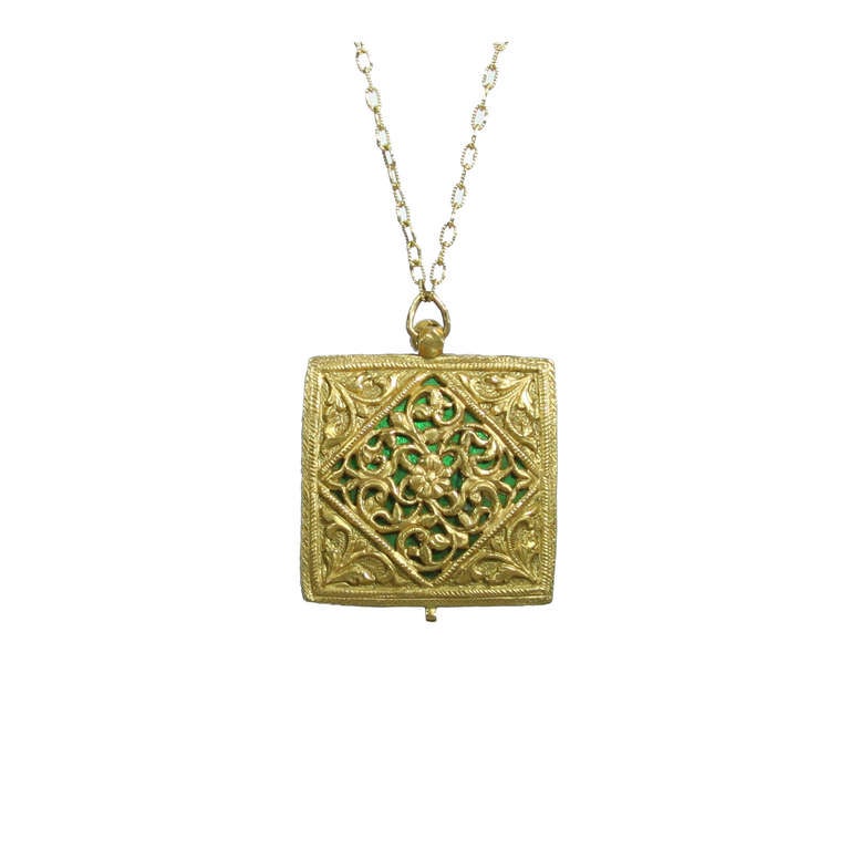 Mughal Style Turquoise Pendant with Rose Cut Diamonds set in Gold by Amyn The Jeweler ™

The back shows beautiful intricate gallery work.

Recreation of Jewelry worn by The Mughal's who ruled India from the early Fifteen Hundreds until the late