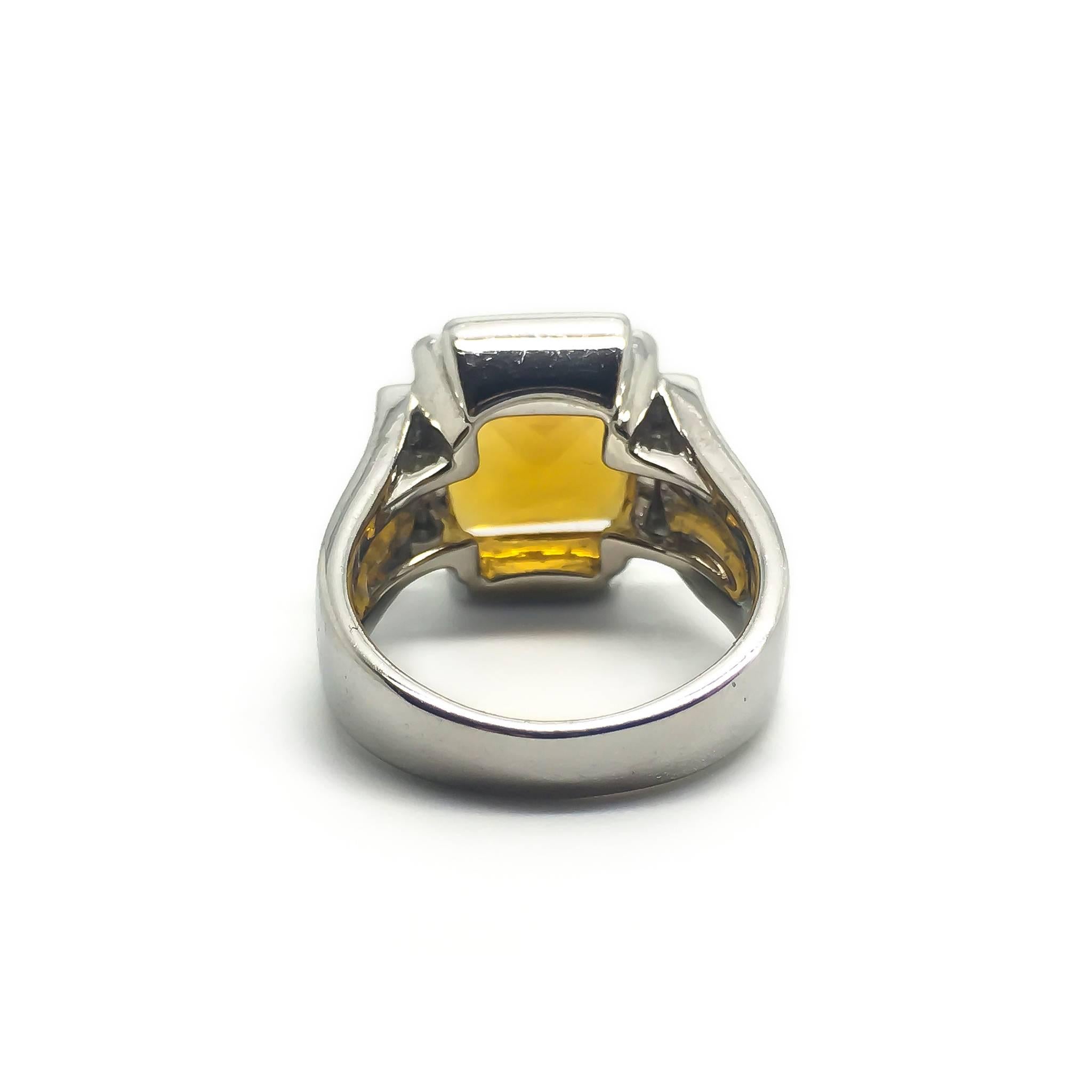 An 18ct White gold ring by Chatila. 

Set with a citrine with diamonds around the centre stone. 

UK size M

US size 6

Citrine is 10.65 x 10.49 x 6.29mm = Approximately 4.45cts

Total diamond weight is approximately 0.32cts.

Signed Chatila. 

12.3g