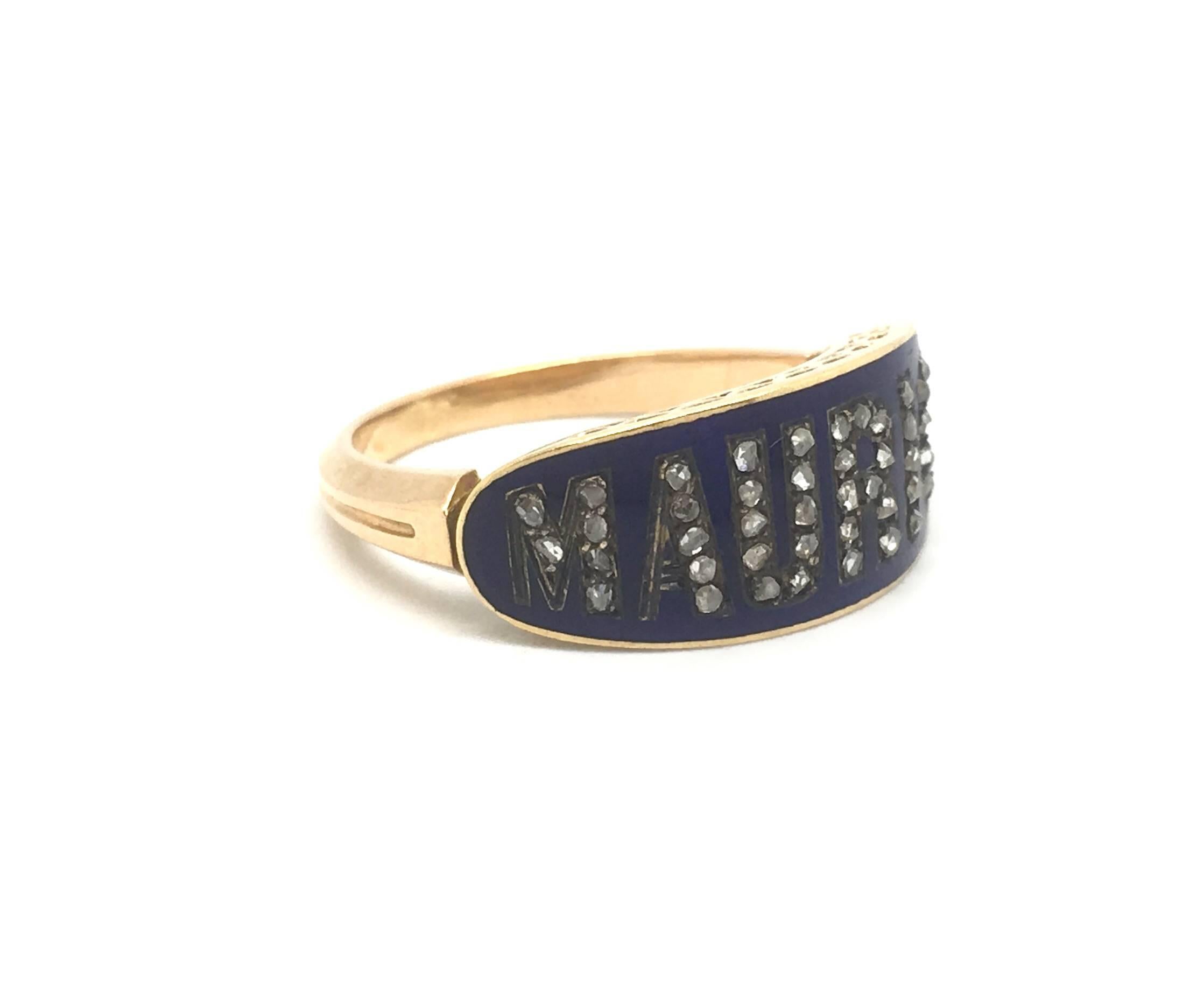 An exceptionally rare gold and enamel ring spelling out the name 