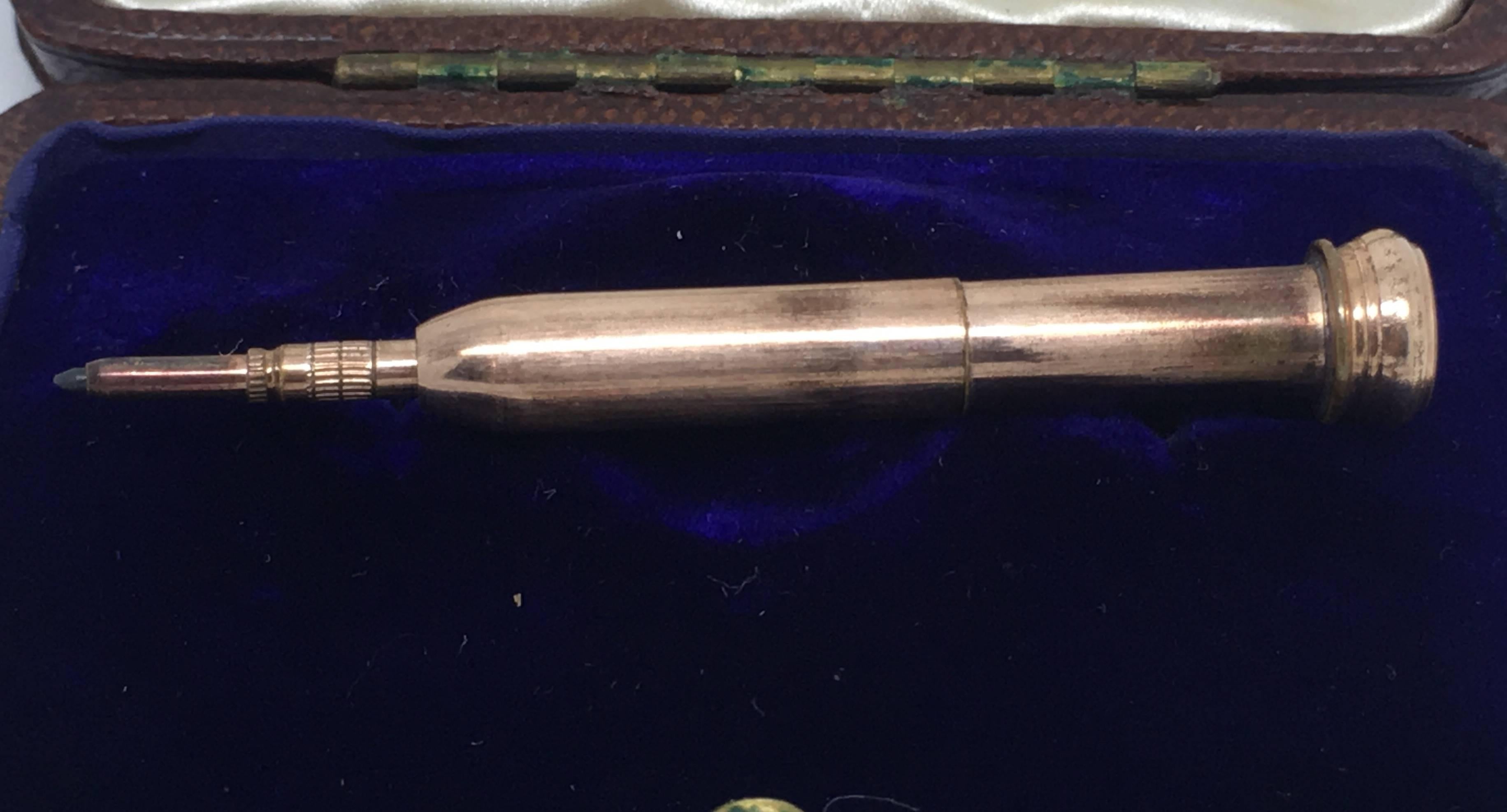 An antique propelling pencil dating to circa 1910.

The engine turned enamel is in wonderful clean condition and is a striking yellow colour.

3.3cm in length when closed.

6.8g

The pencil works perfectly and is refillable with lead. 

Great clean